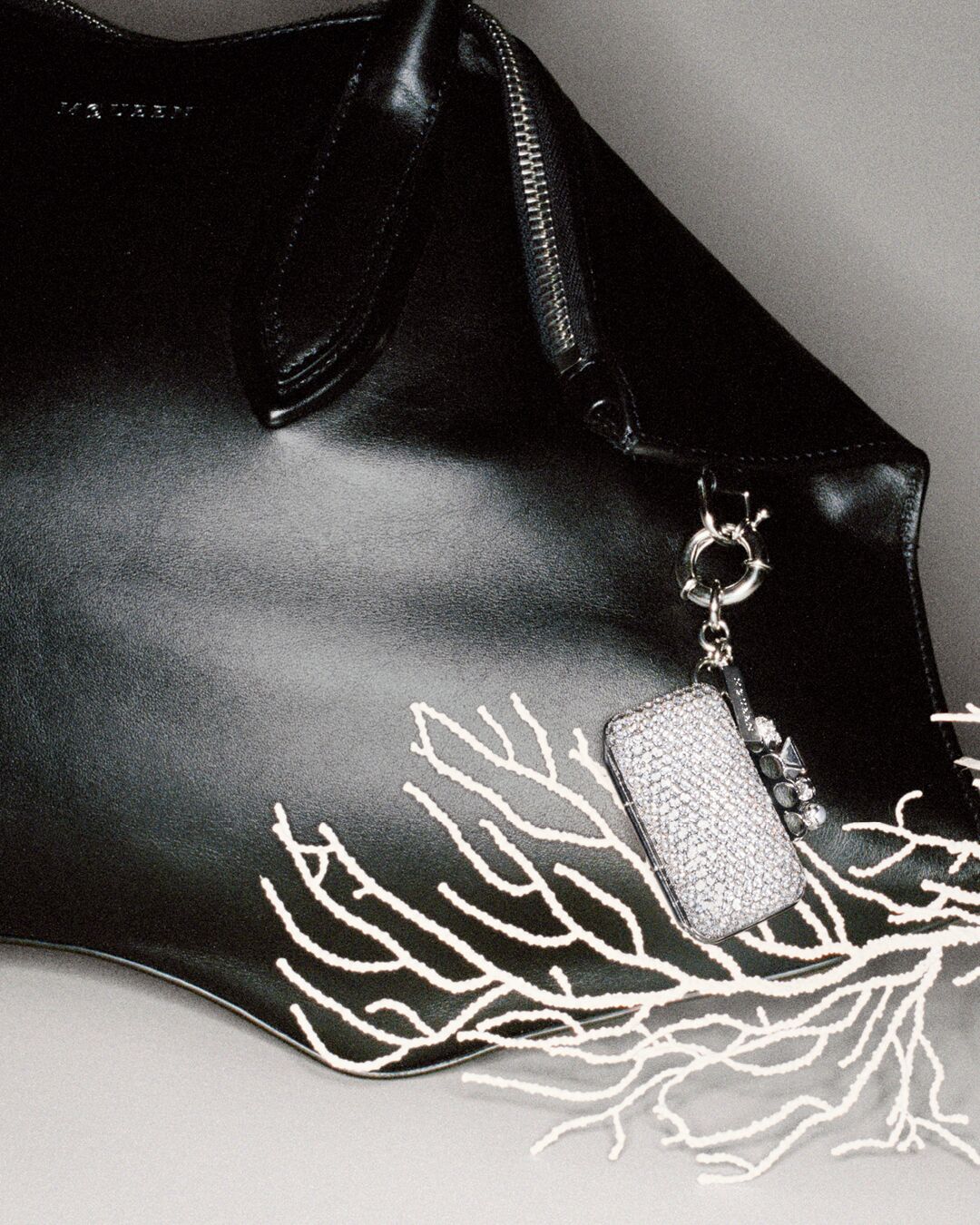 Women in McQueen silver earrings