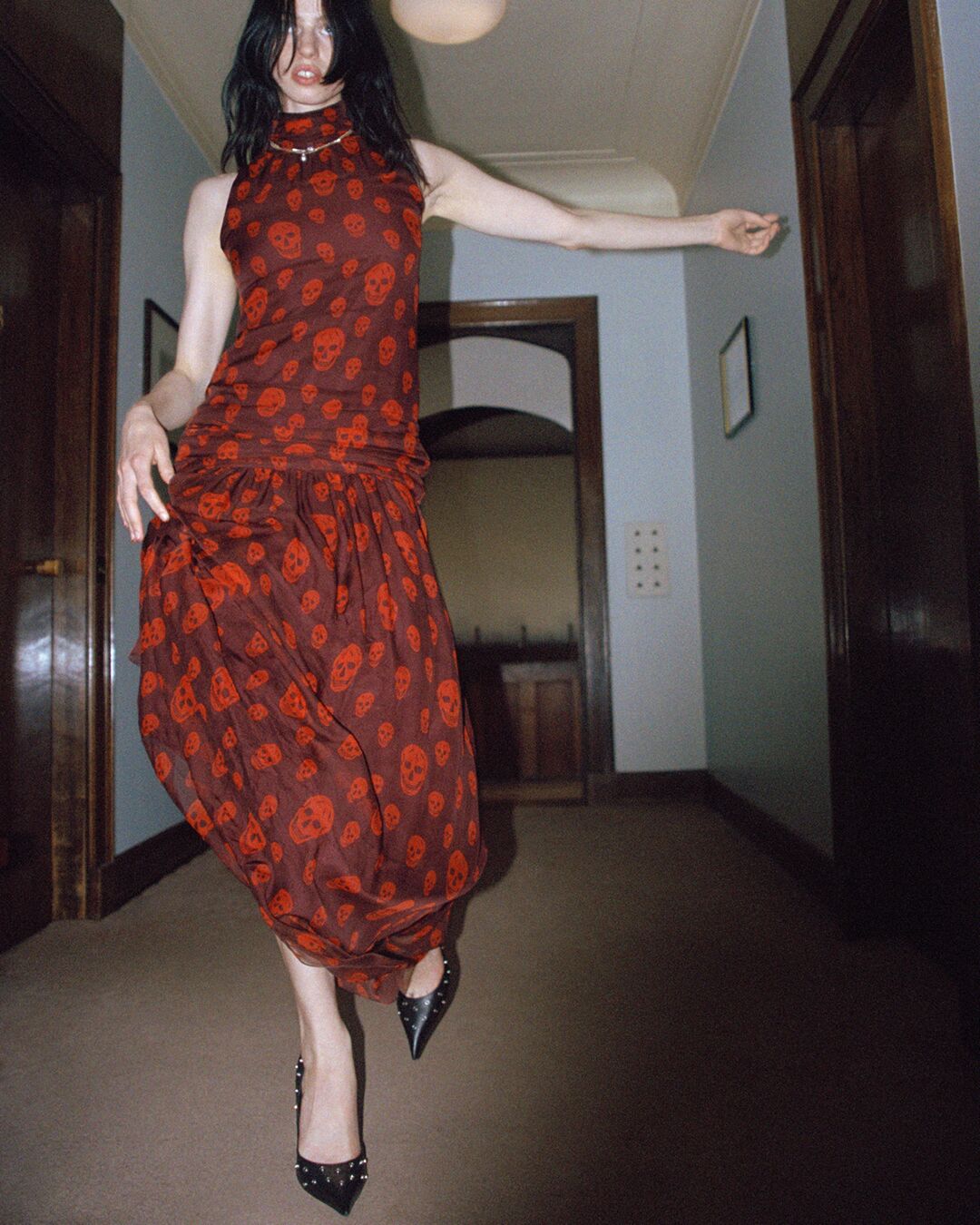 Model on set for McQueen Pre SS26 Campaign