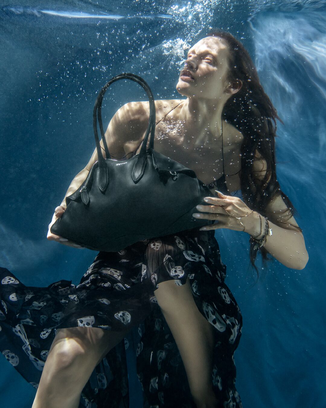 McQueen Manta in black with charms