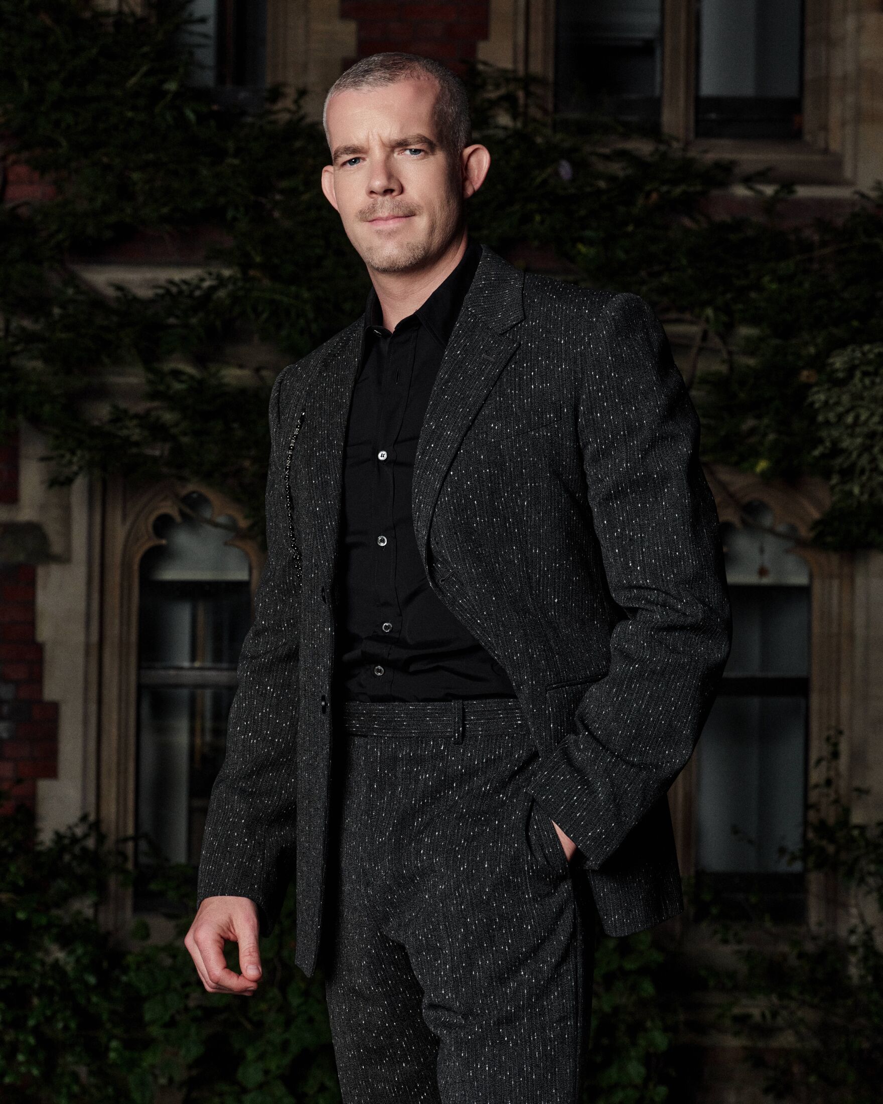 Russel Tovey wearing Alexander McQueen