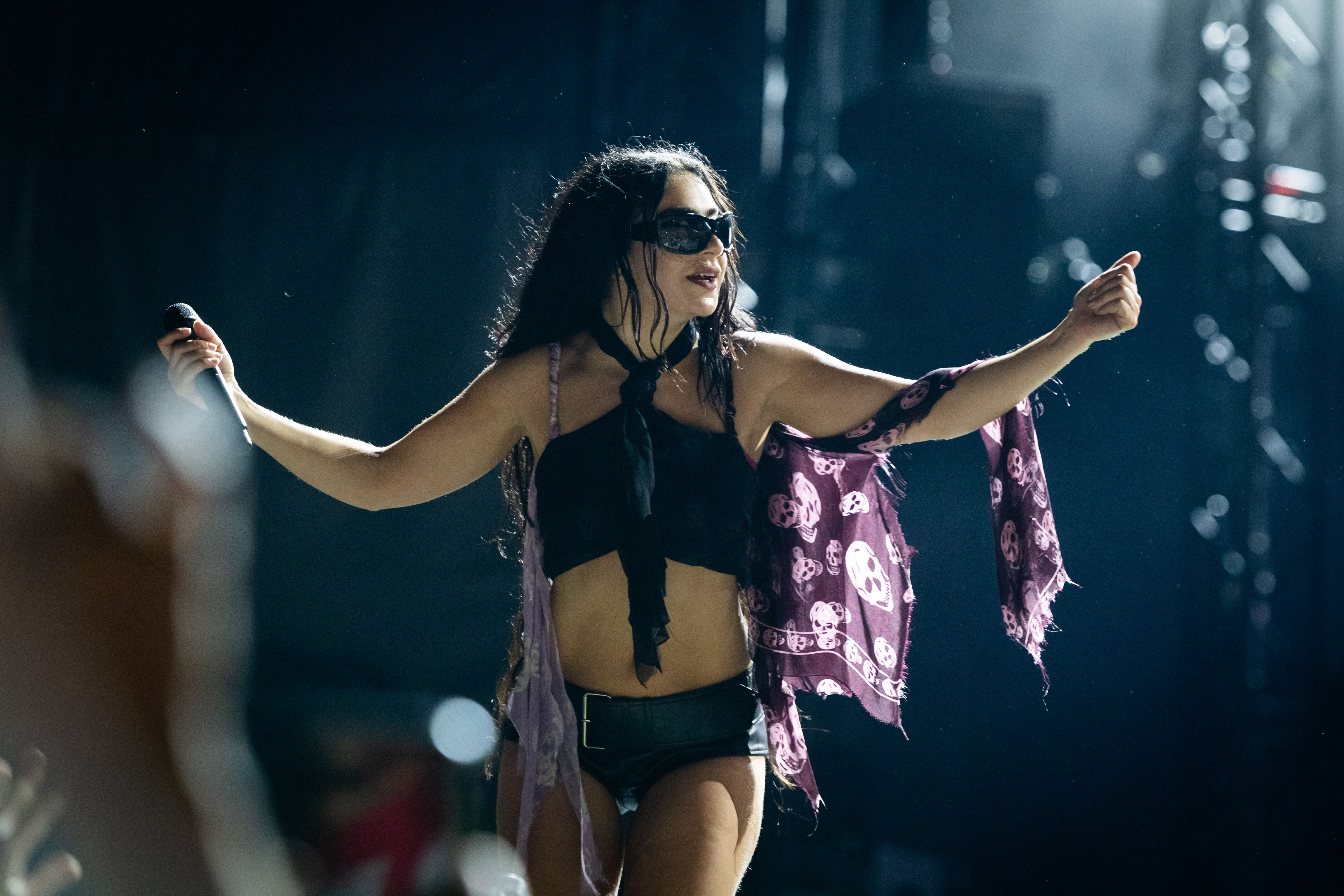 Charli xcx wearing custom McQueen skull scarf top for Glastonbury 2025 performance