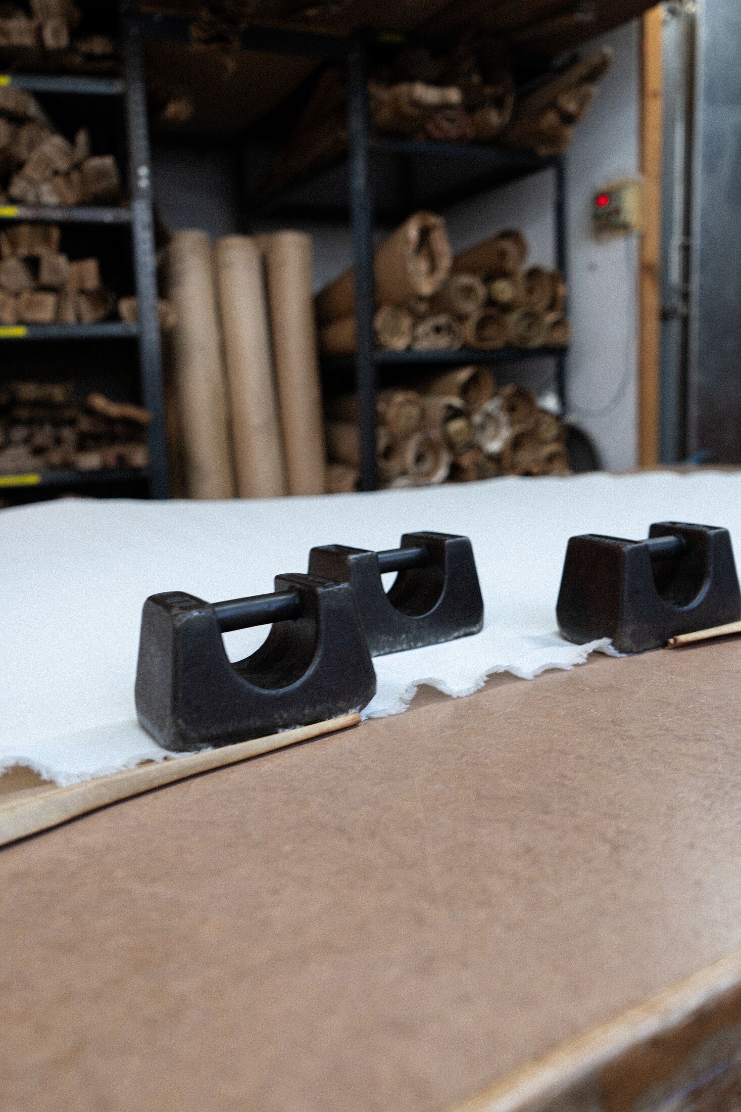 Fabric weights used to stabilise fabric while sunray pleats are set