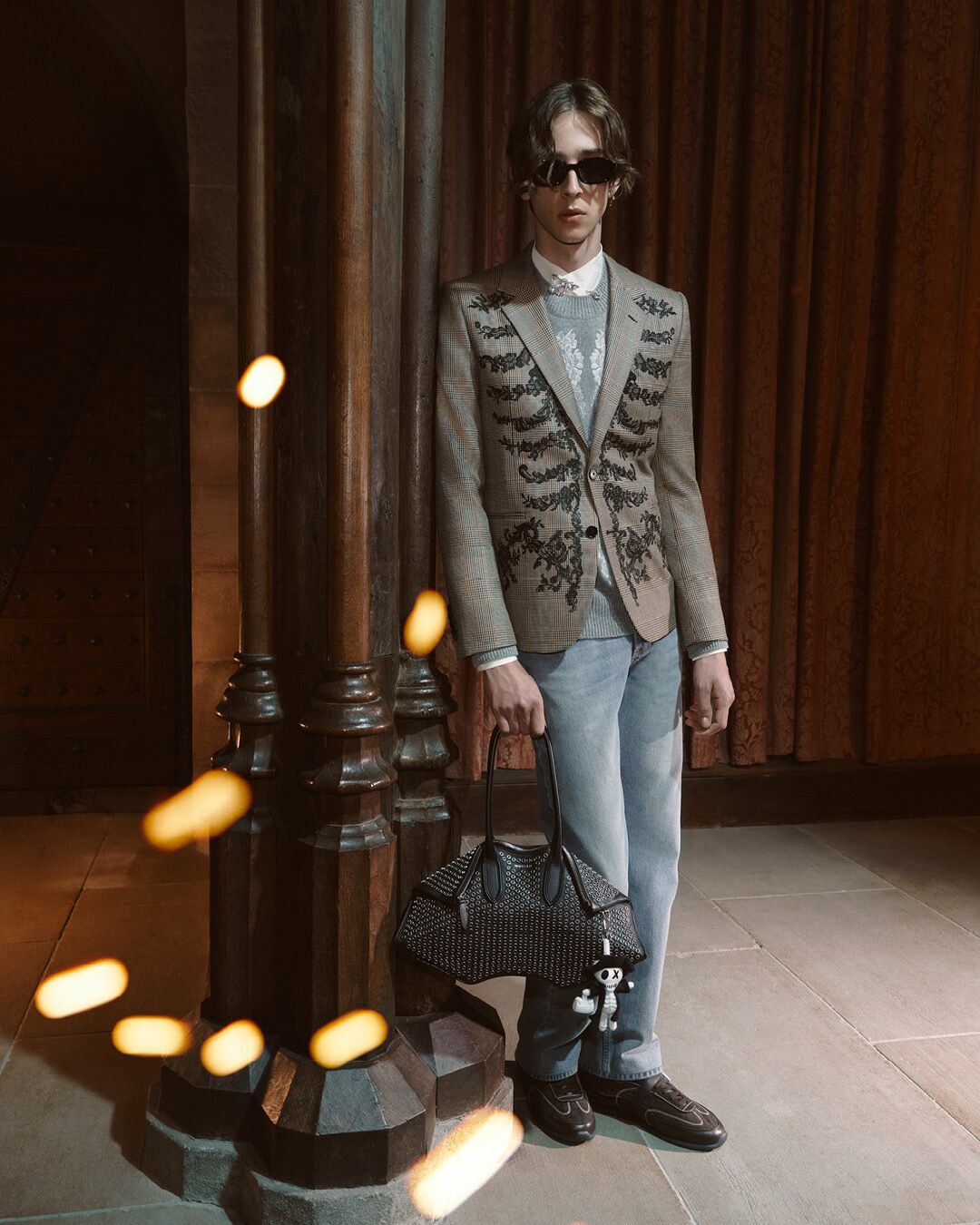 Model on set for McQueen Pre SS26 Campaign