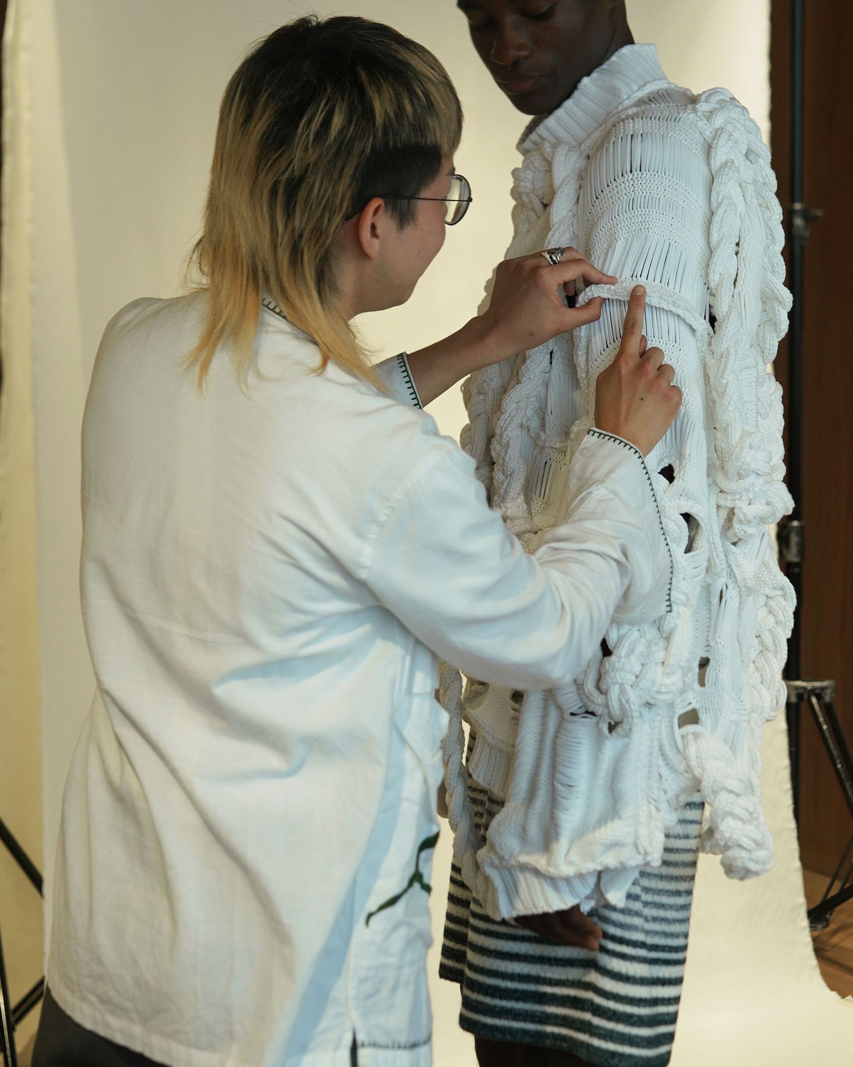 Student presenting work to McQueen team