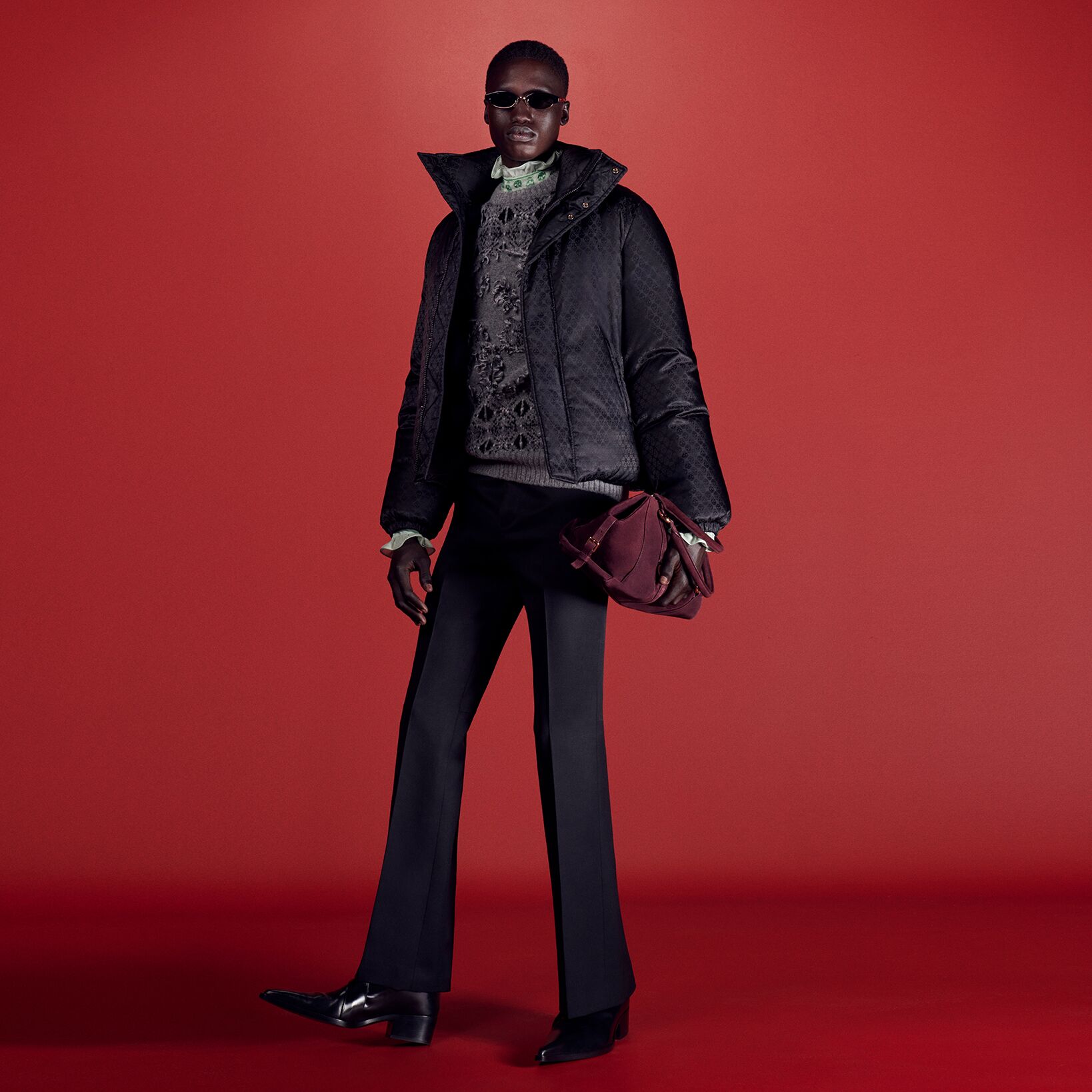 Man in McQueen winter coat