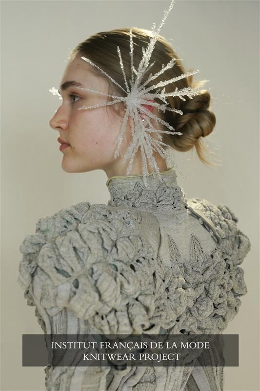 Models wearing students work for final review