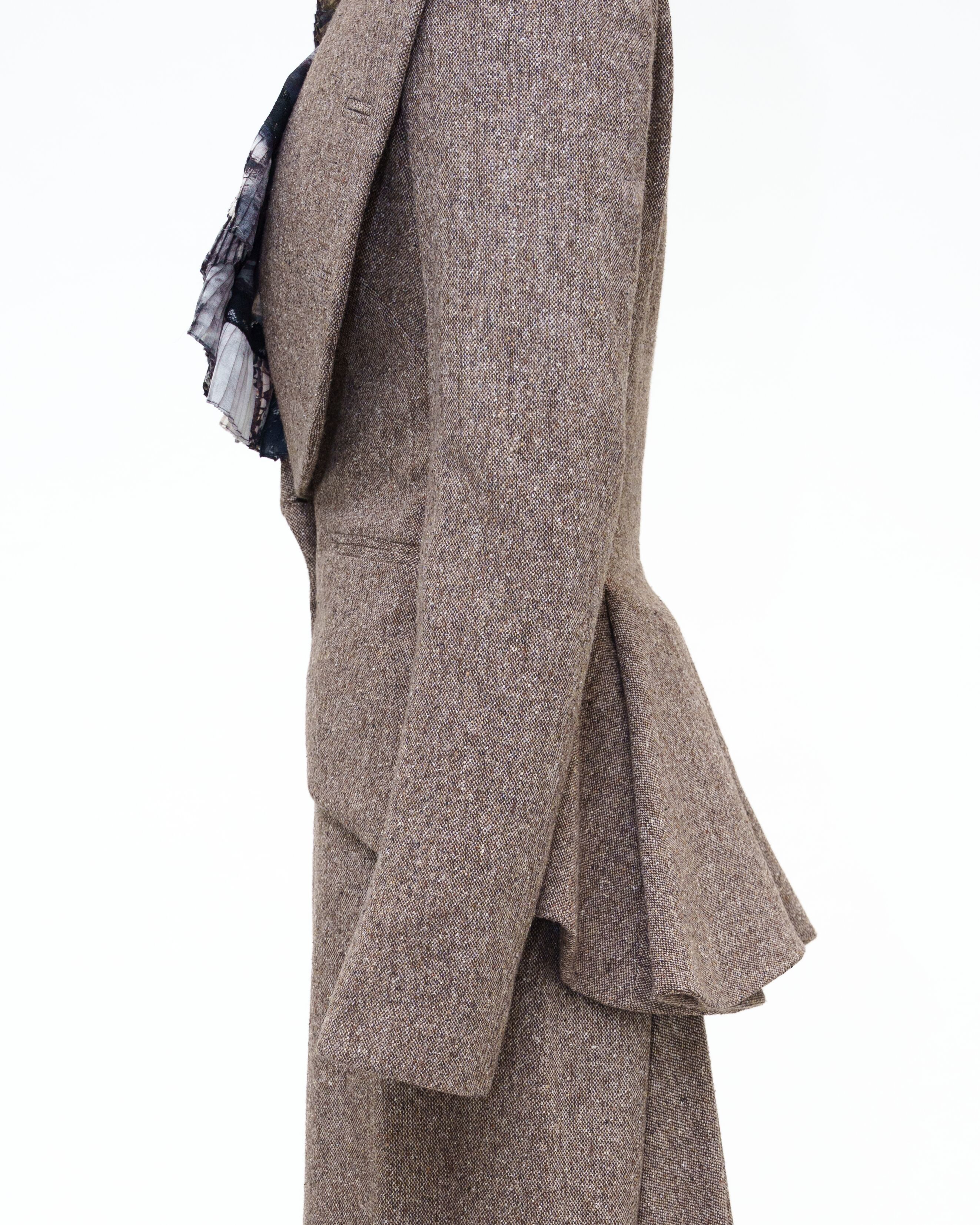 Close up of sleeve detail on tailored jacket