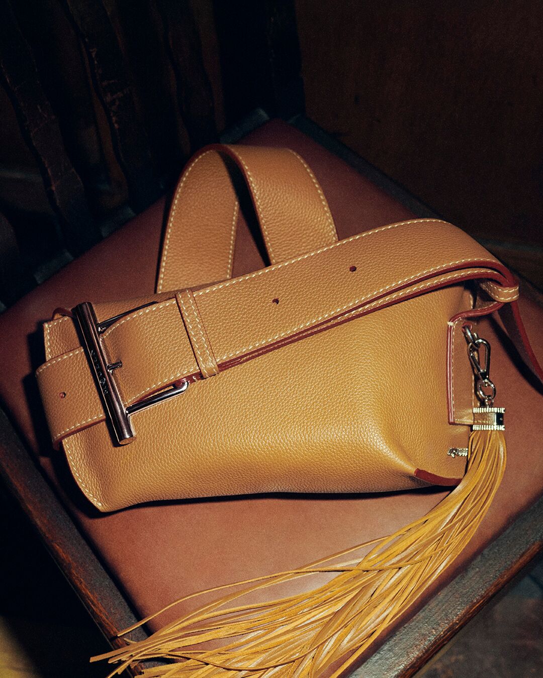 McQueen T-Bar sling bag in Tan