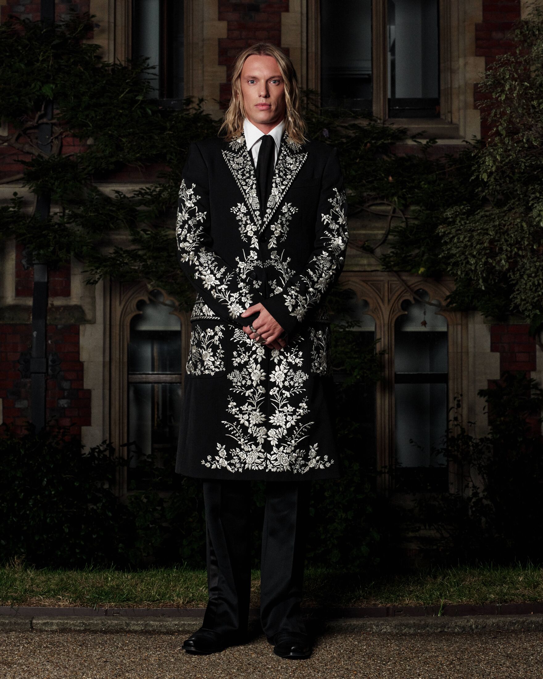 Jamie Campbell Bower wearing Alexander McQueen