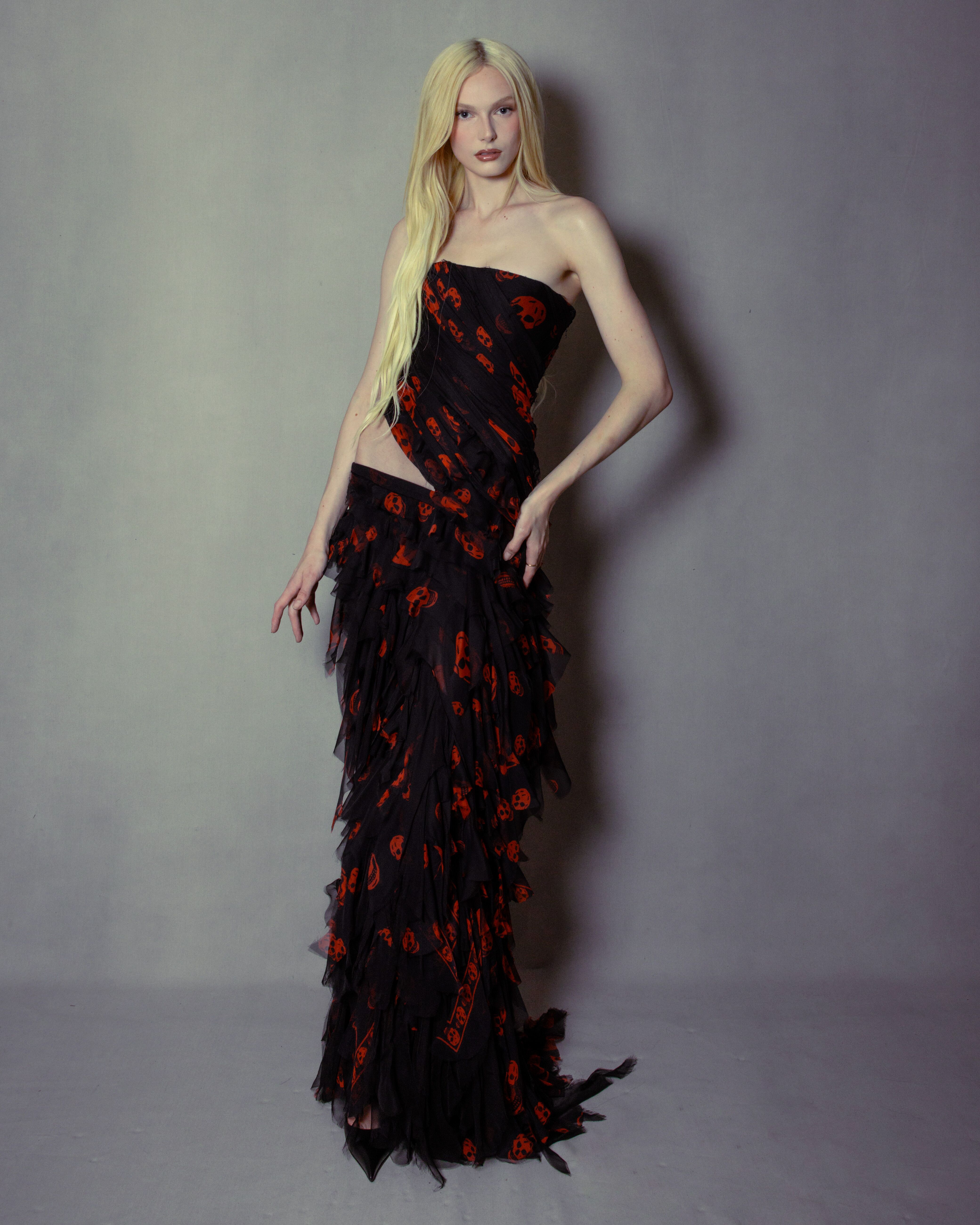 Custom dress worn by Alex Consani, in layered and draped skull-printed chiffon