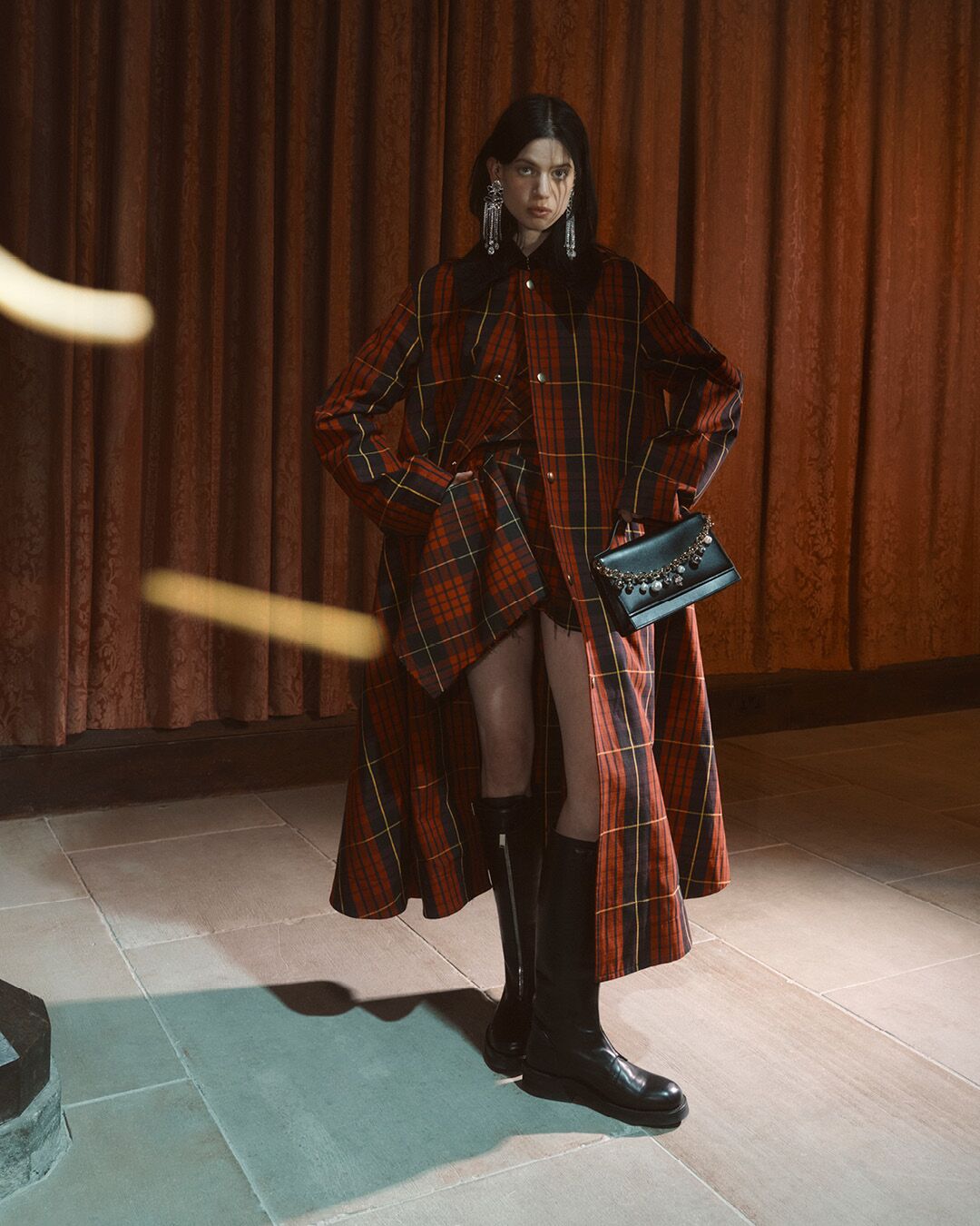 Model on set for McQueen Pre SS26 Campaign