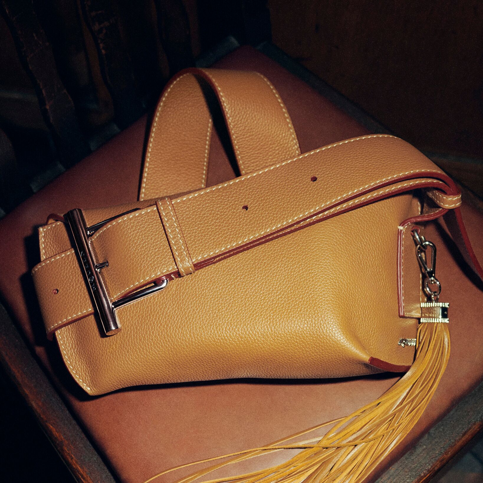 McQueen T-Bar sling bag in Tan