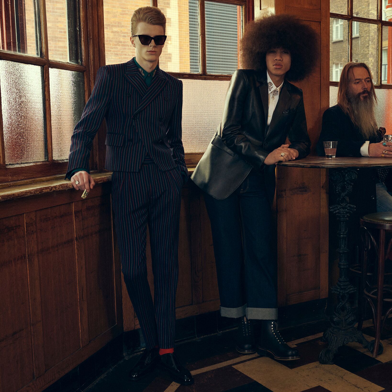 McQueen london check tailoring, man wearing tailored trousers and a tailored McQueen jacket
