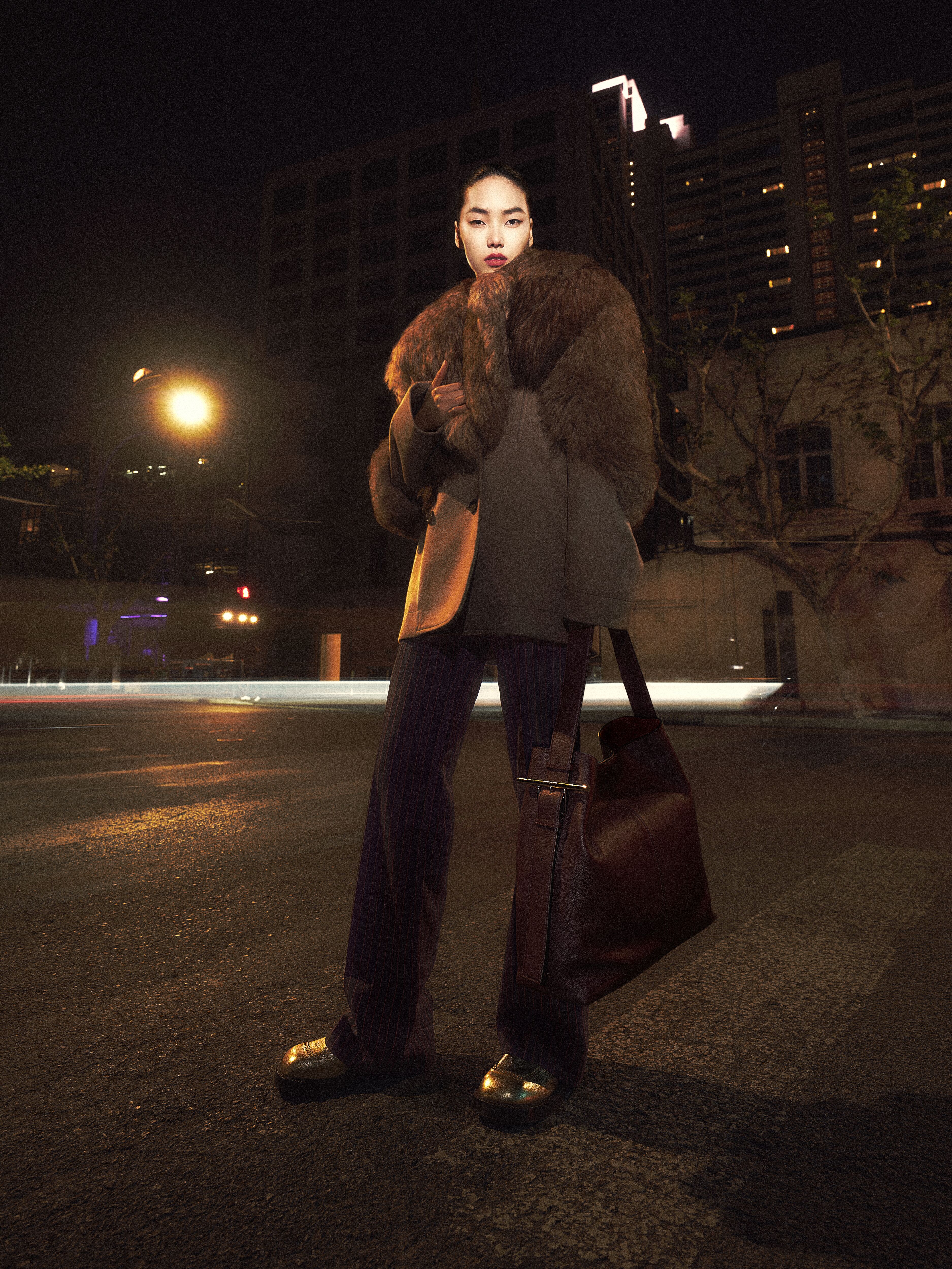 Jiajahui Zhang wearing McQueen Spring Summer 2025 Pre-Collection with T-Bar Sling Shoulder in Oxblood