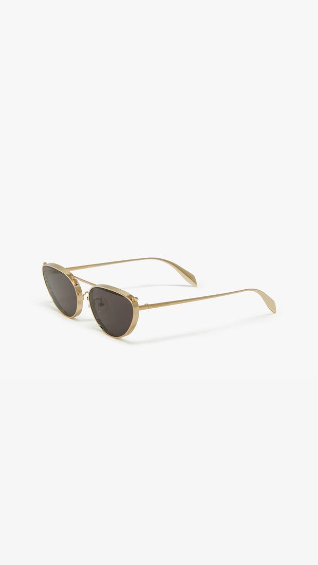 McQueen sunglasses with gold frame