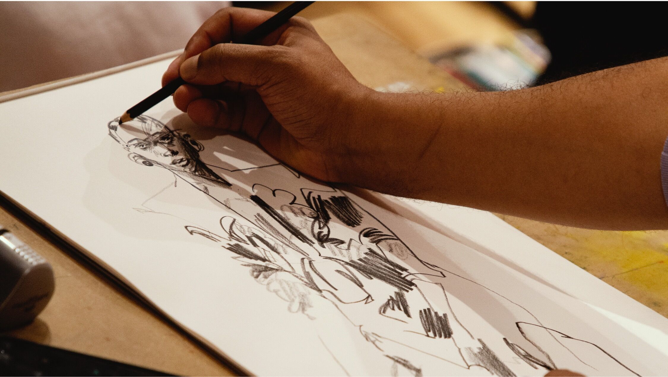Student illustrating at workshop