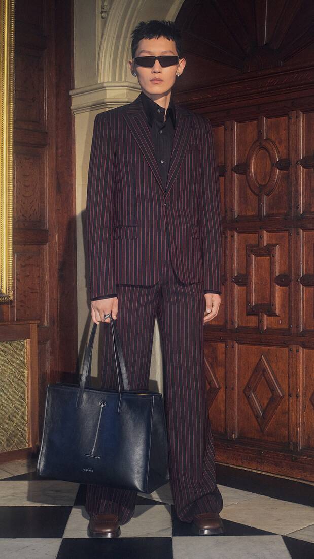 Man in pinstripe tailored suit