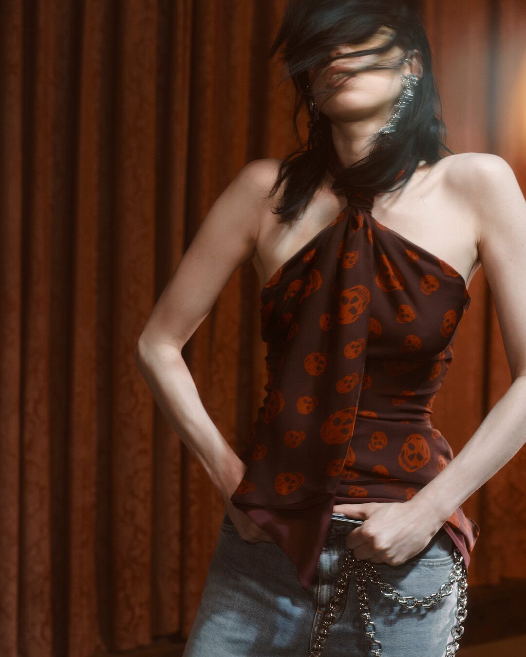 Model on set for McQueen Pre SS26 Campaign