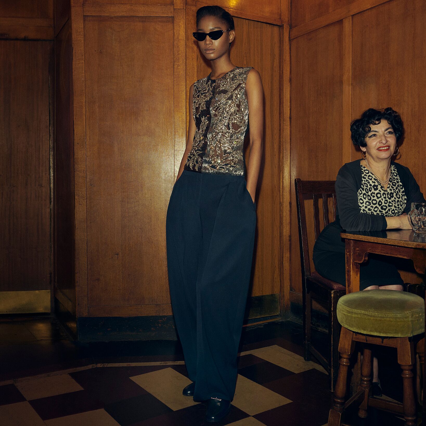 Alexander McQueen evening embellished top and black trousers