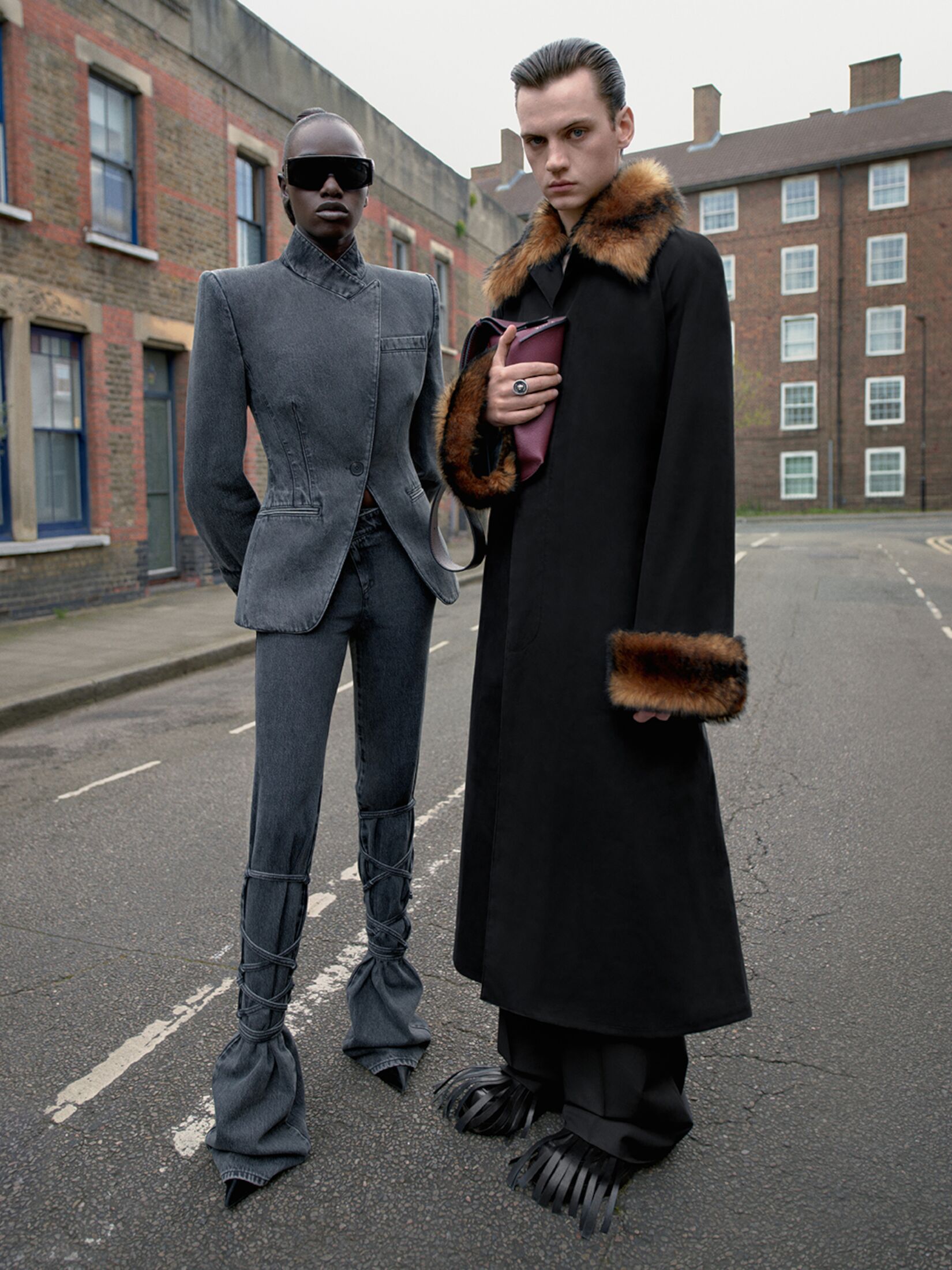 Man in a long wool coat with fur cuffs