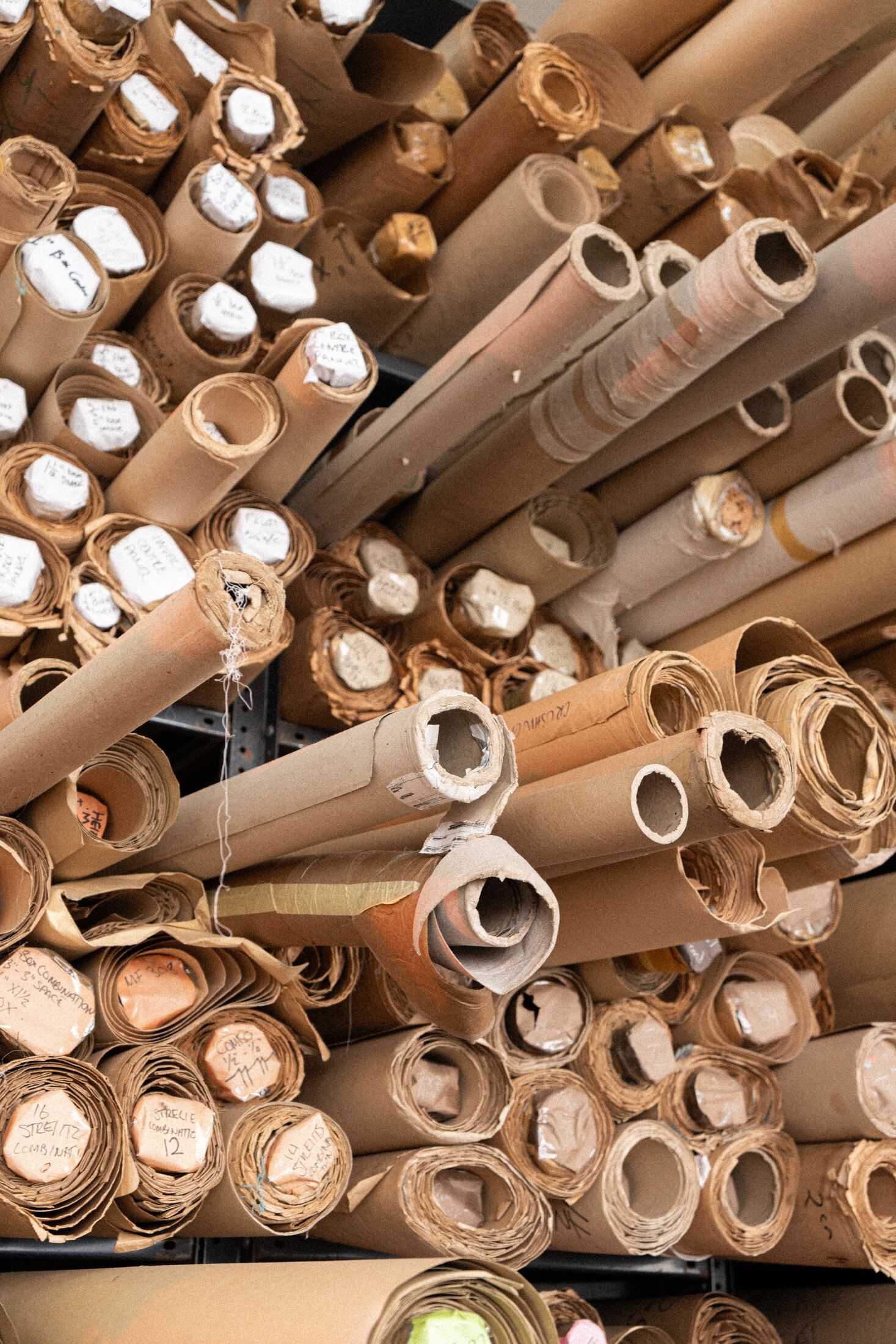 Cardboard pleating moulds rolled up