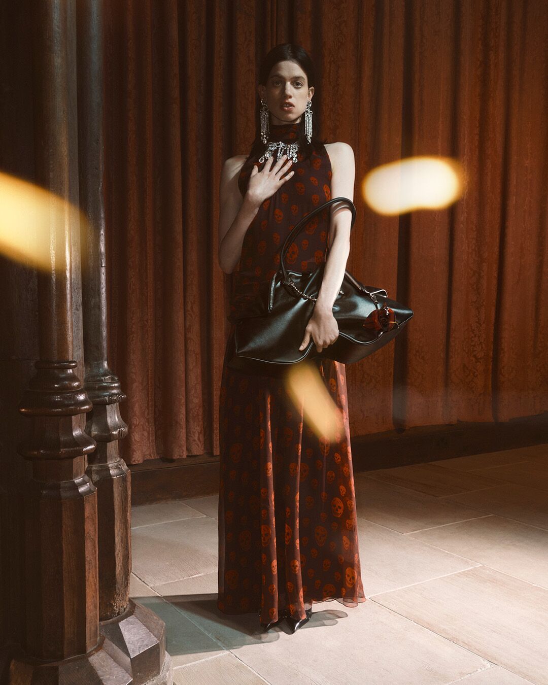 Model on set for McQueen Pre SS26 Campaign