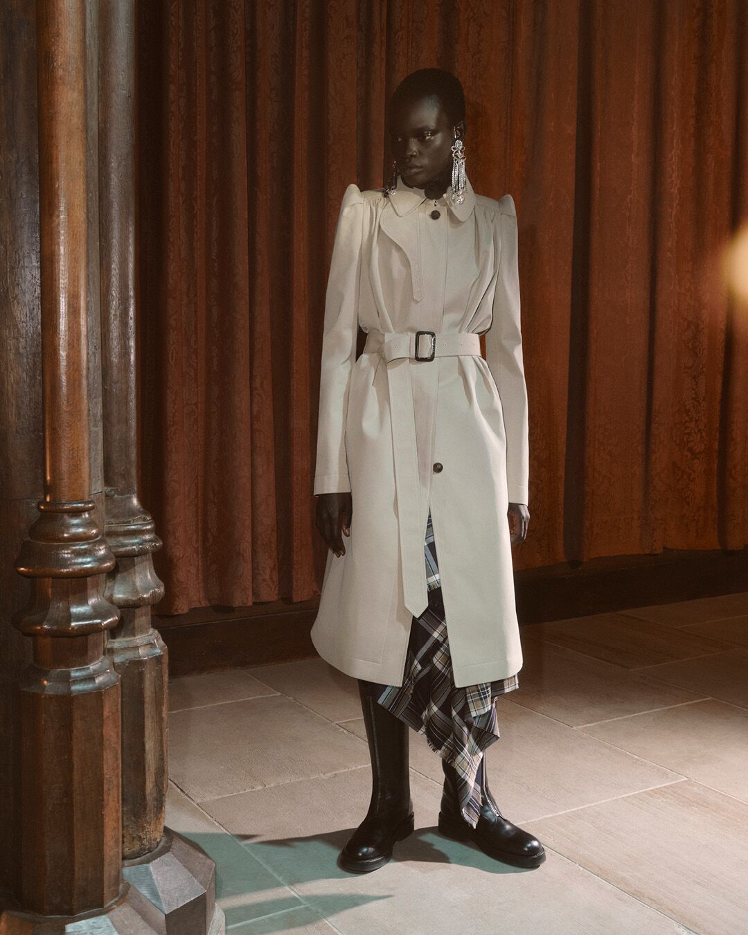 Model on set for McQueen Pre SS26 Campaign