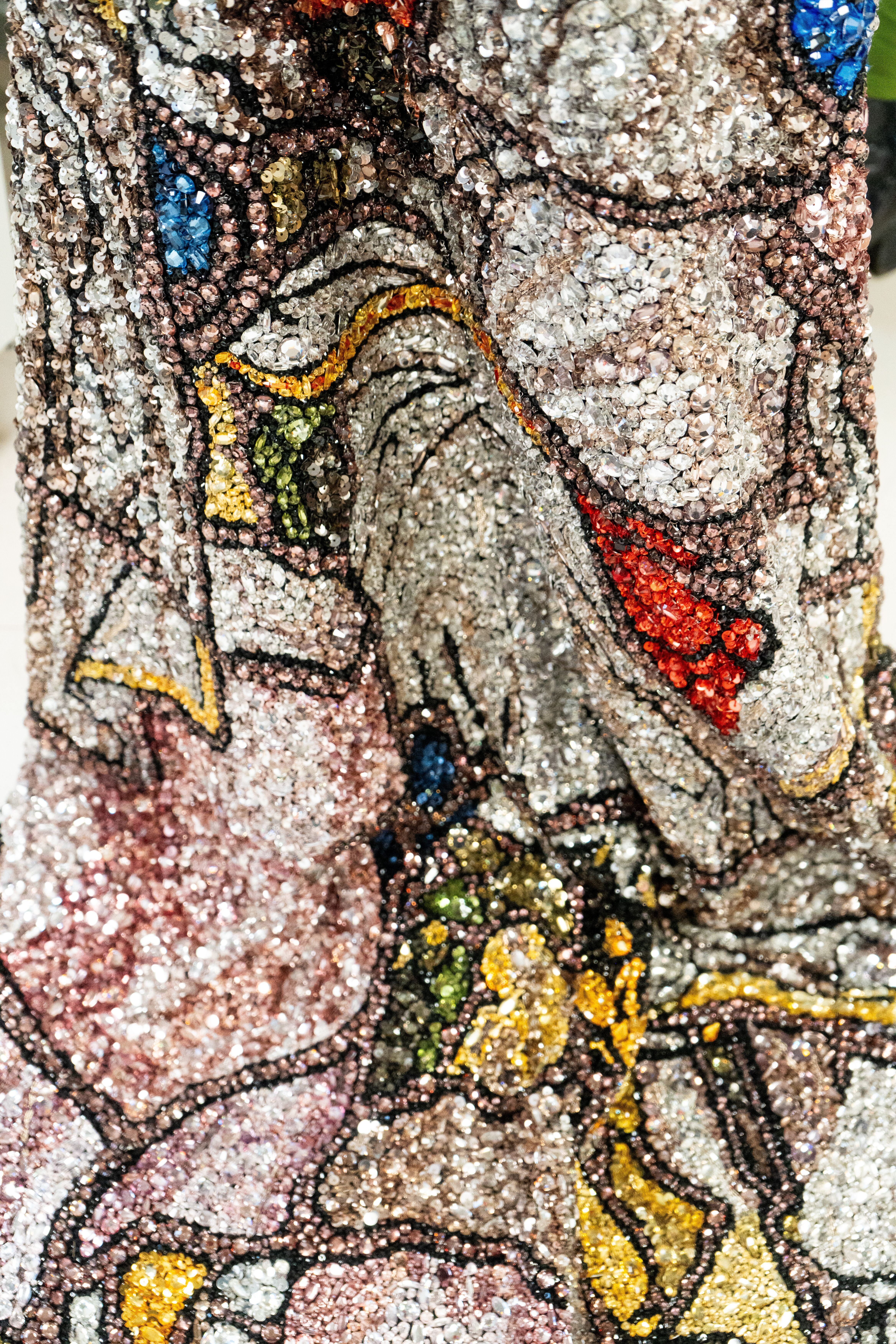 Close up image of stained-glass embroidery
