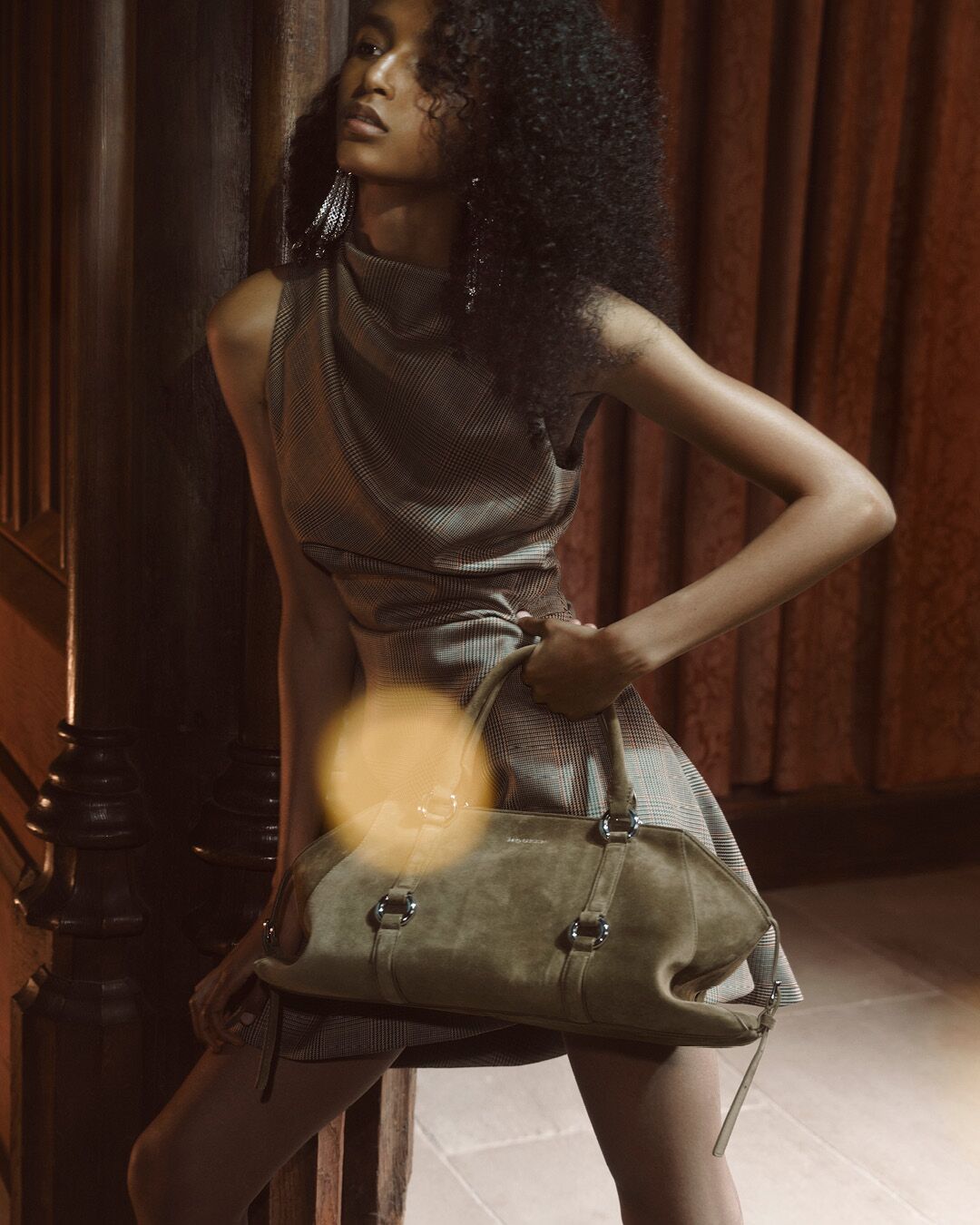 Model on set for McQueen Pre SS26 Campaign