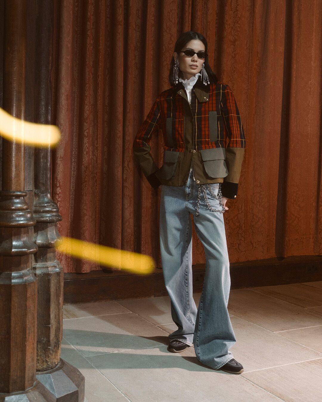 Model on set for McQueen Pre SS26 Campaign