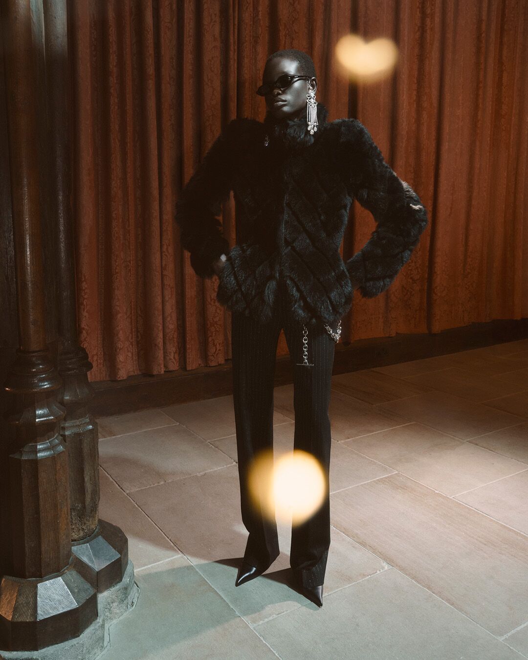 Model on set for McQueen Pre SS26 Campaign