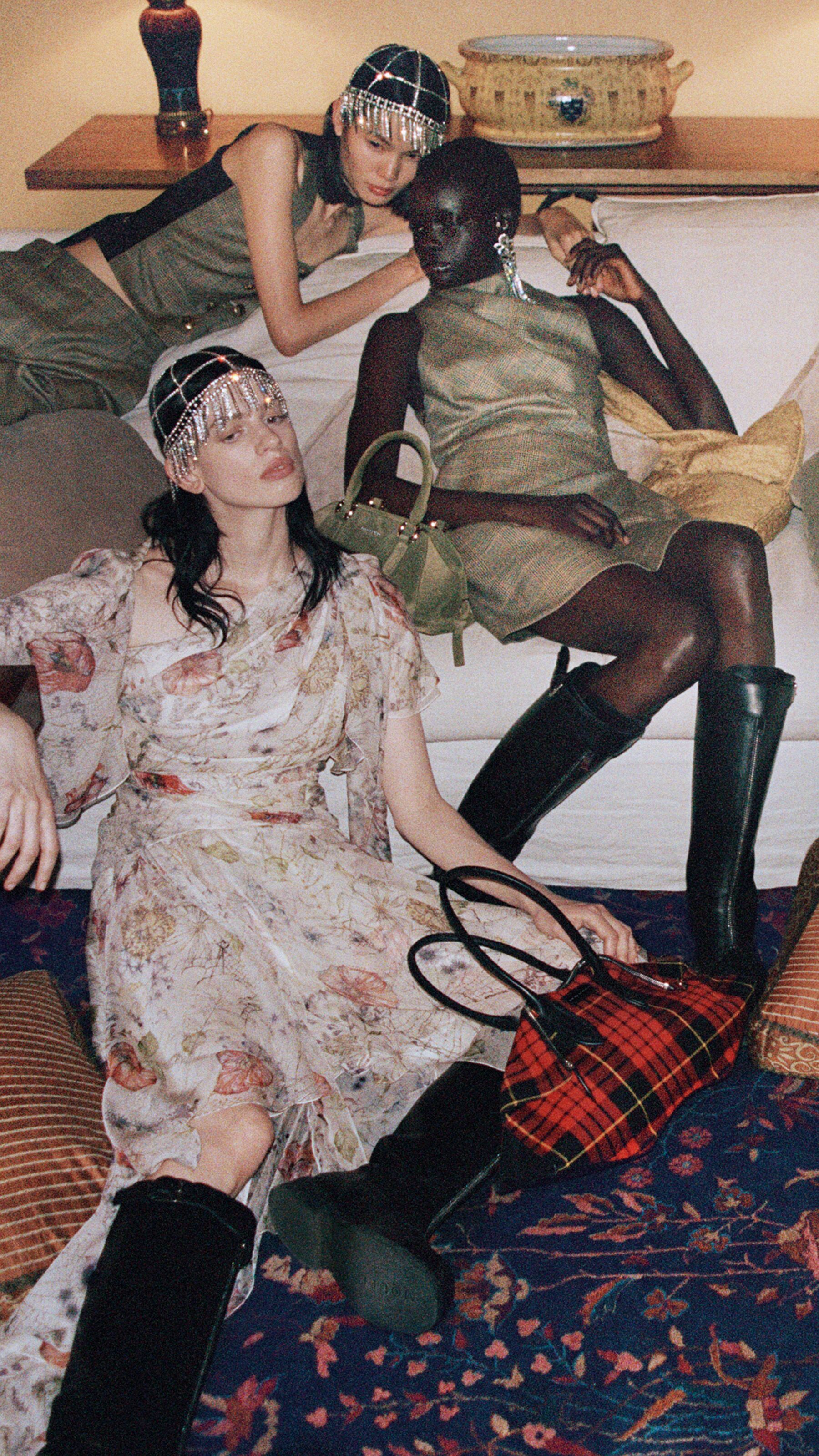 Models wearing a country check and floral McQueen dresses