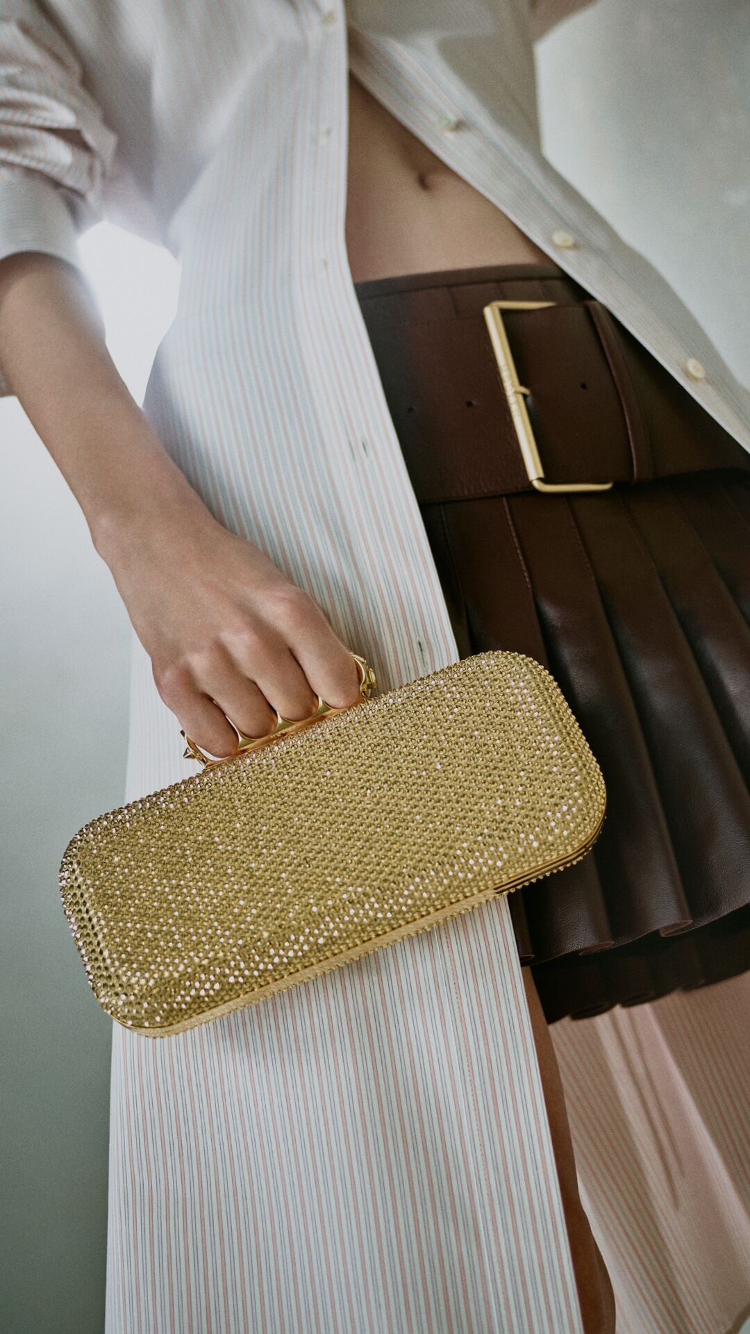 McQueen gold knuckle clutch