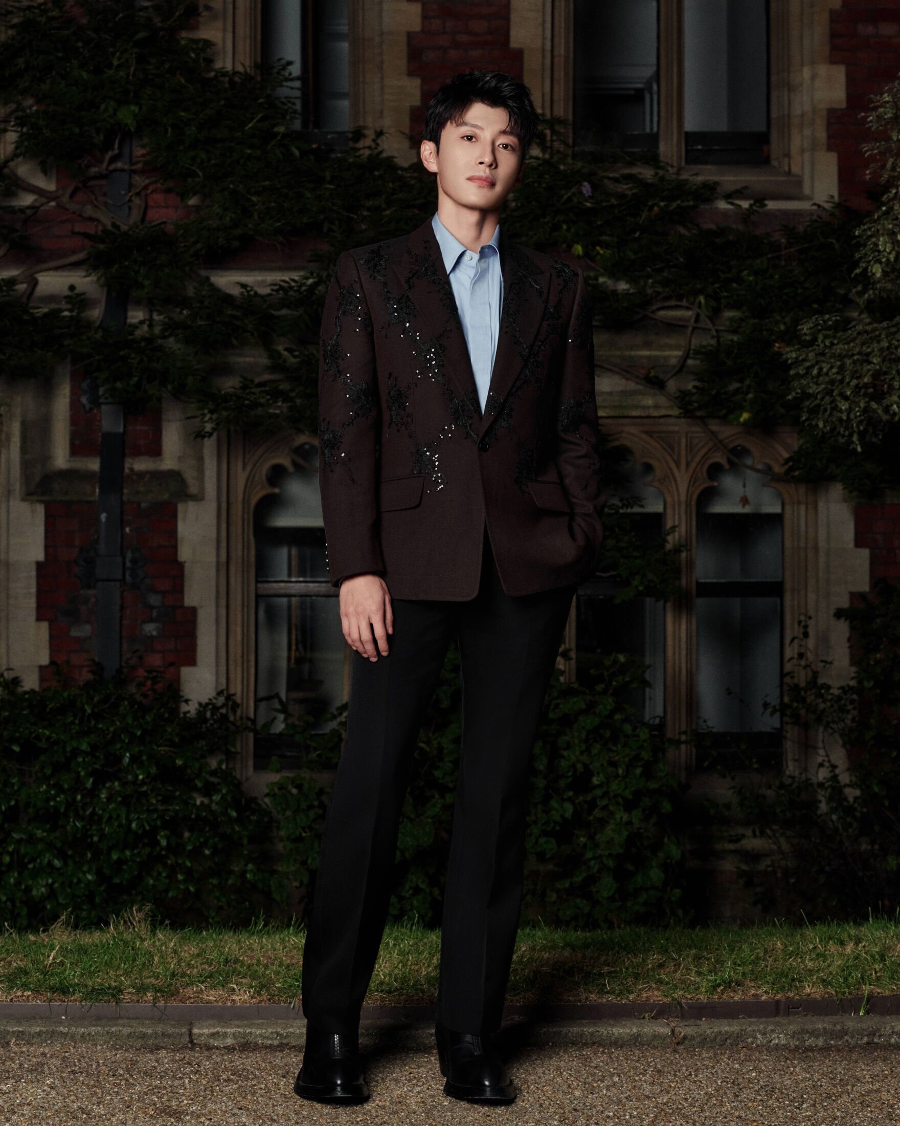 Dai Xu wearing Alexander McQueen
