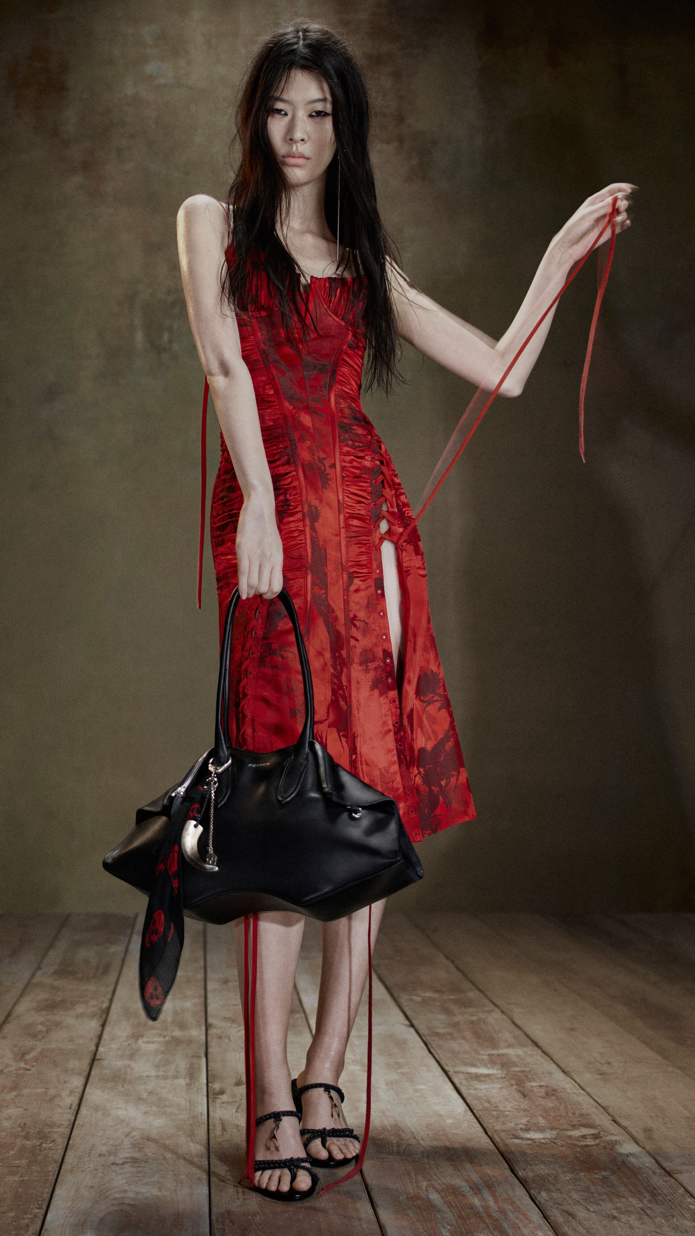 Models wearing a country check and floral McQueen dresses