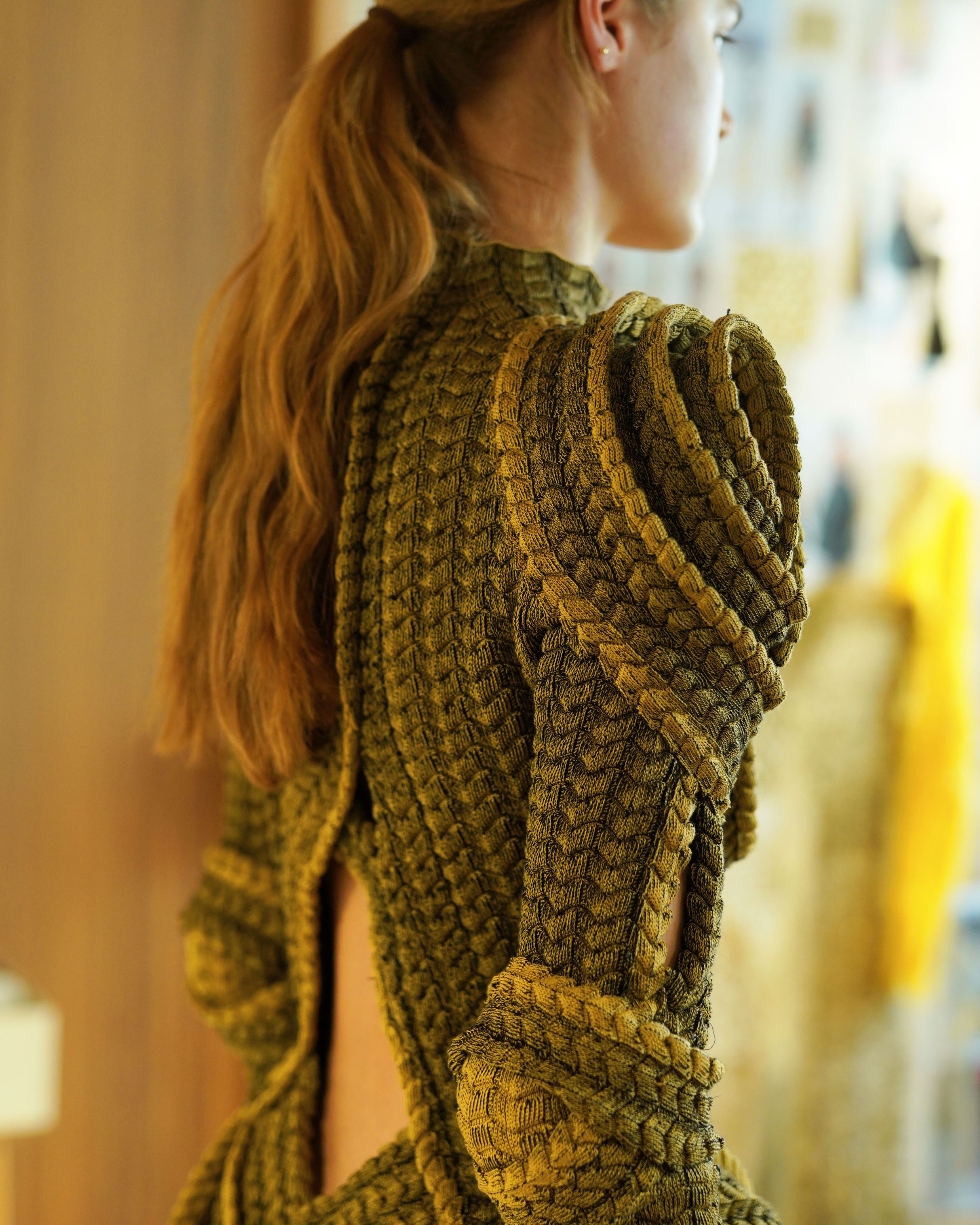 Model wearing student work 