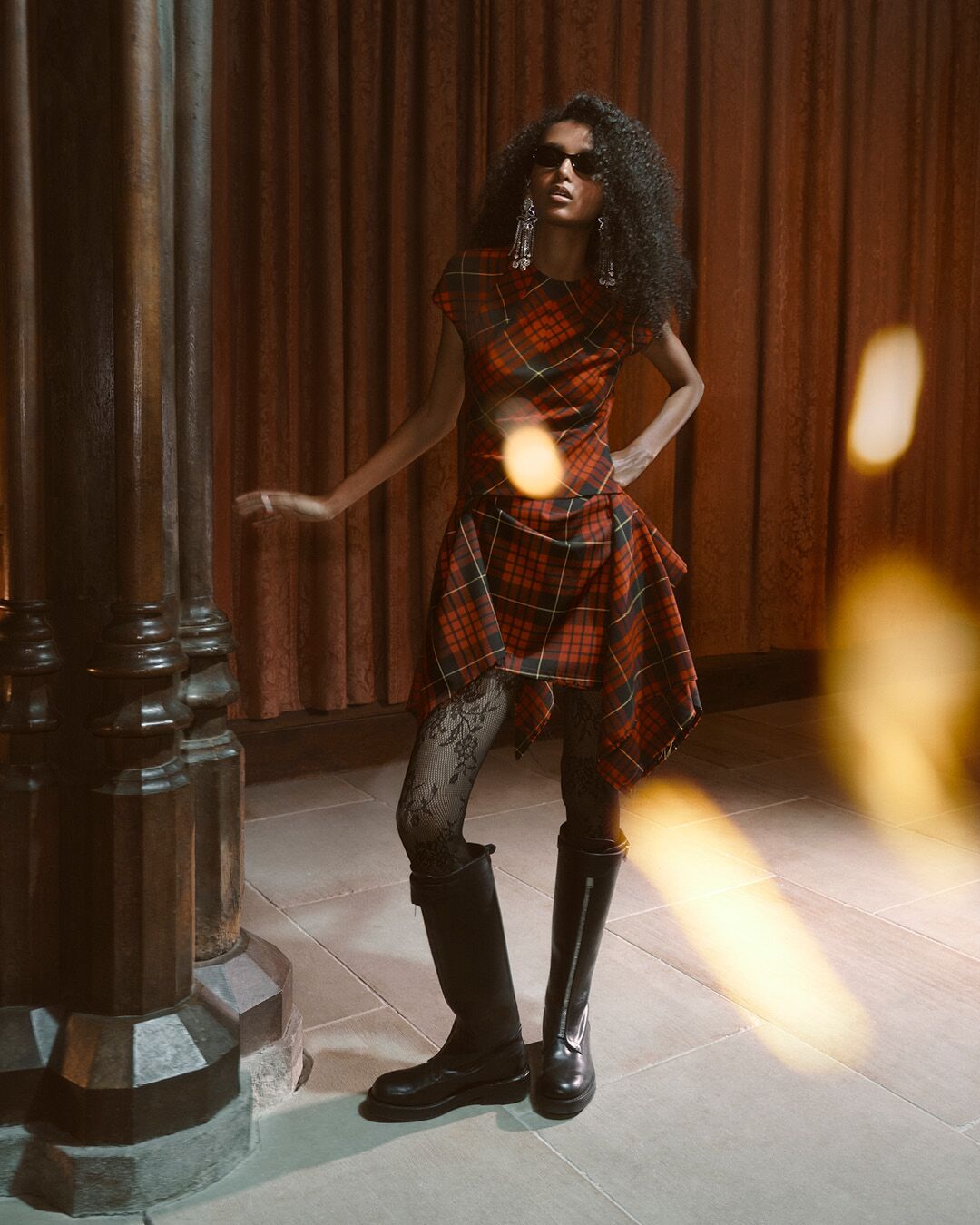 Model on set for McQueen Pre SS26 Campaign