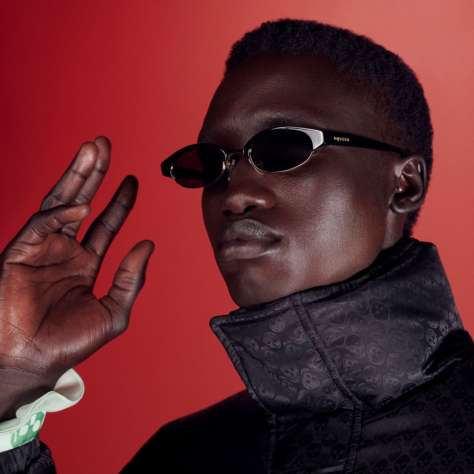 Man in McQueen sunglasses
