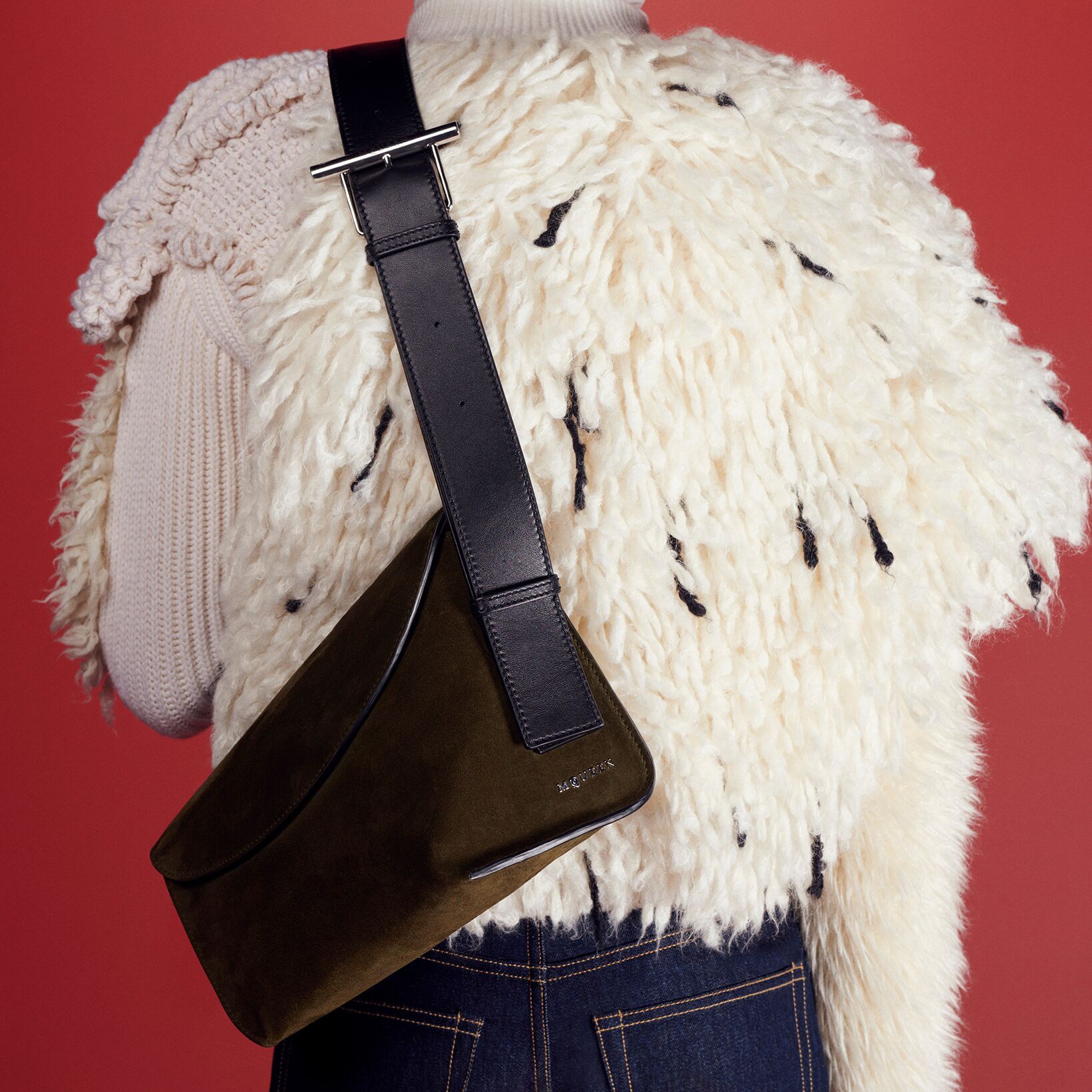 McQueen T-Bar sling bag in Black