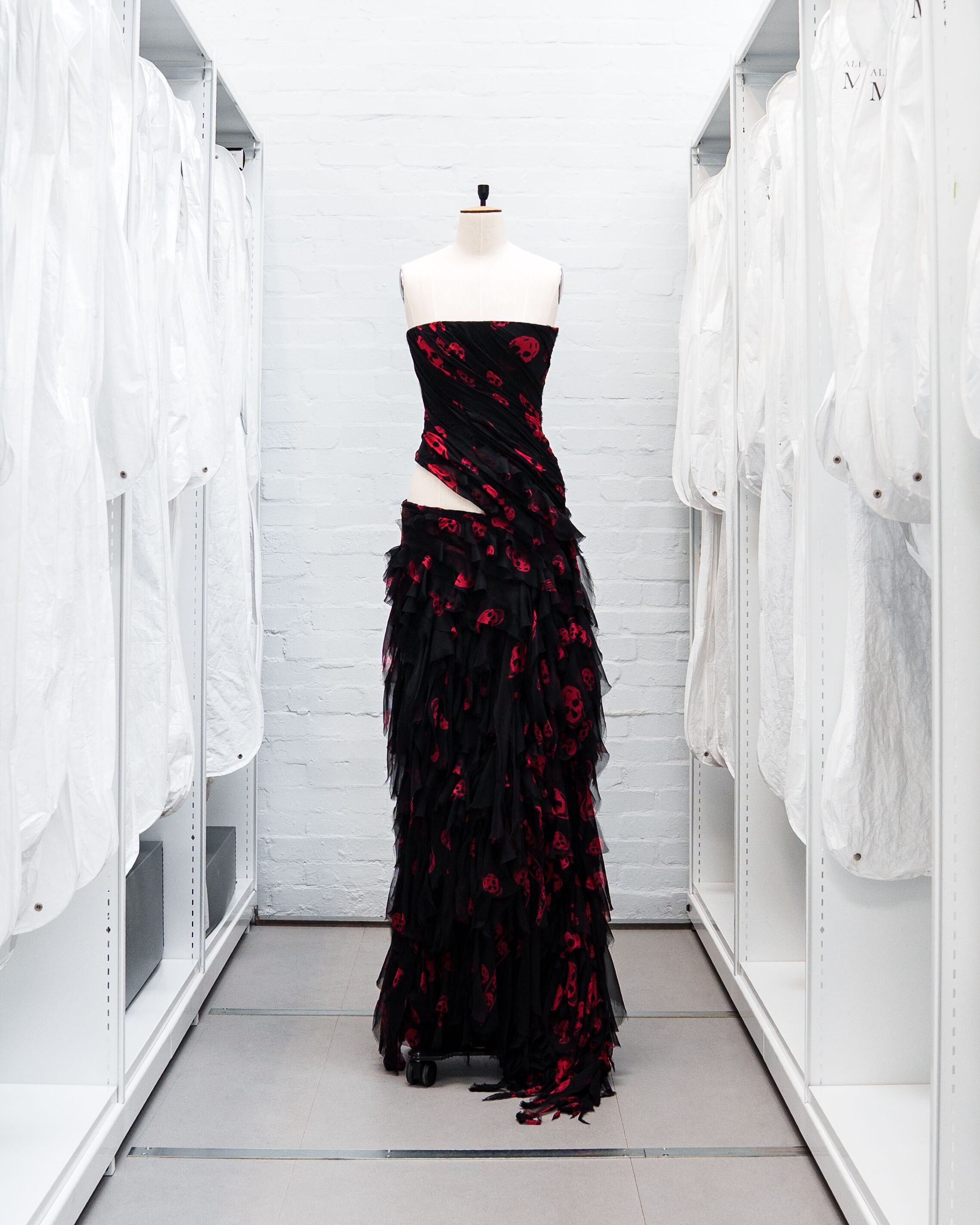 Custom dress worn by Alex Consani, in layered and draped skull-printed chiffon