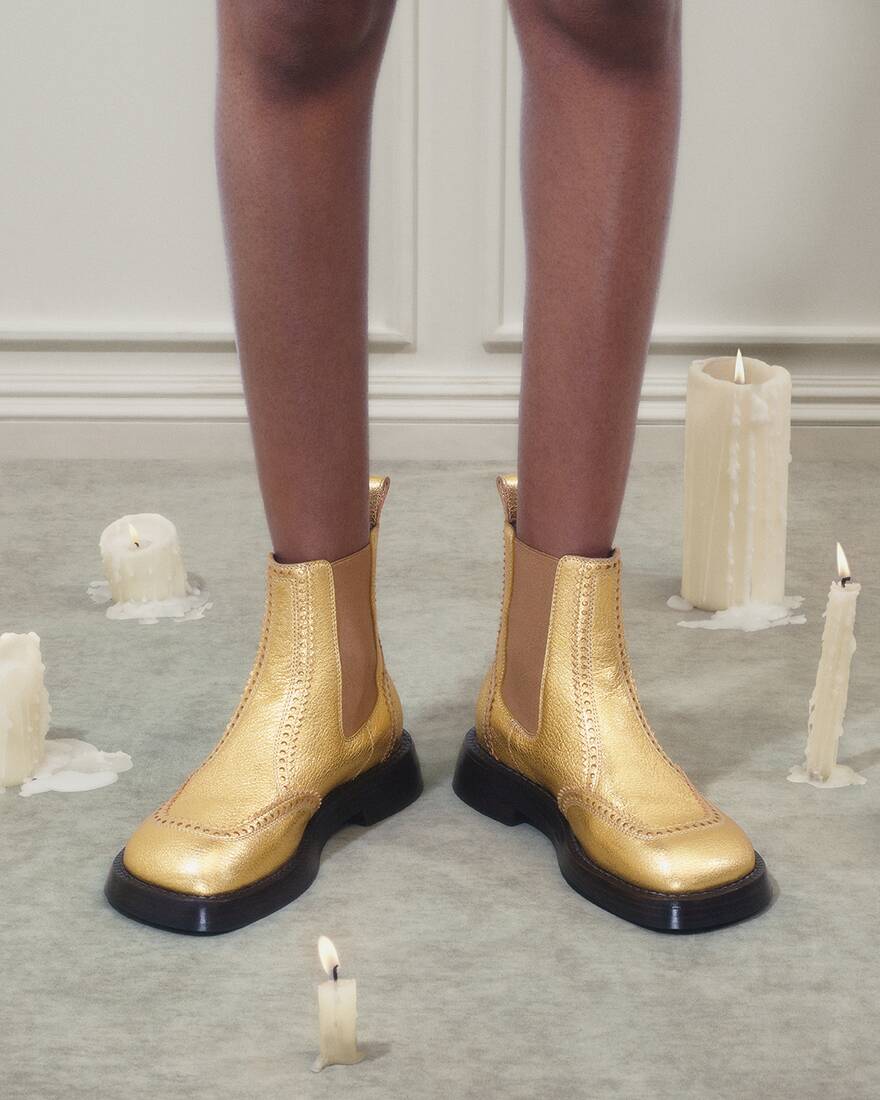 Gold boots 