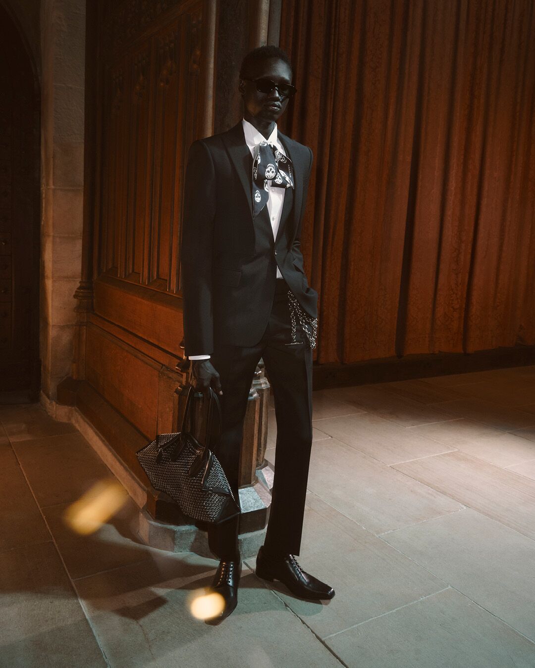 Model on set for McQueen Pre SS26 Campaign