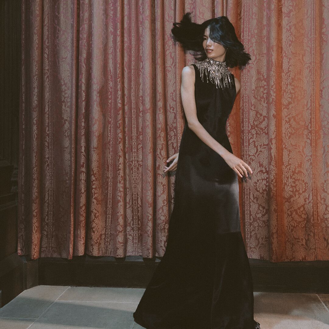 Alexander McQueen footer, complimentary shipping and returns FAQ