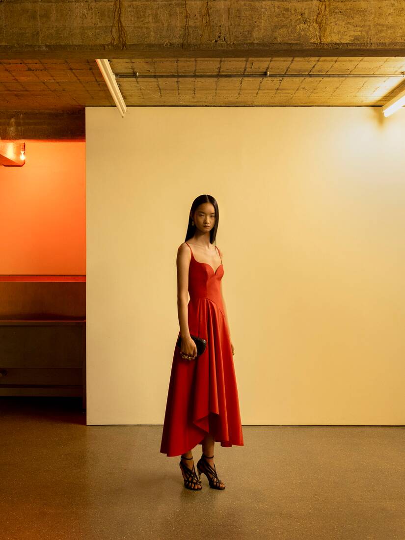 Model wearing a red dress
