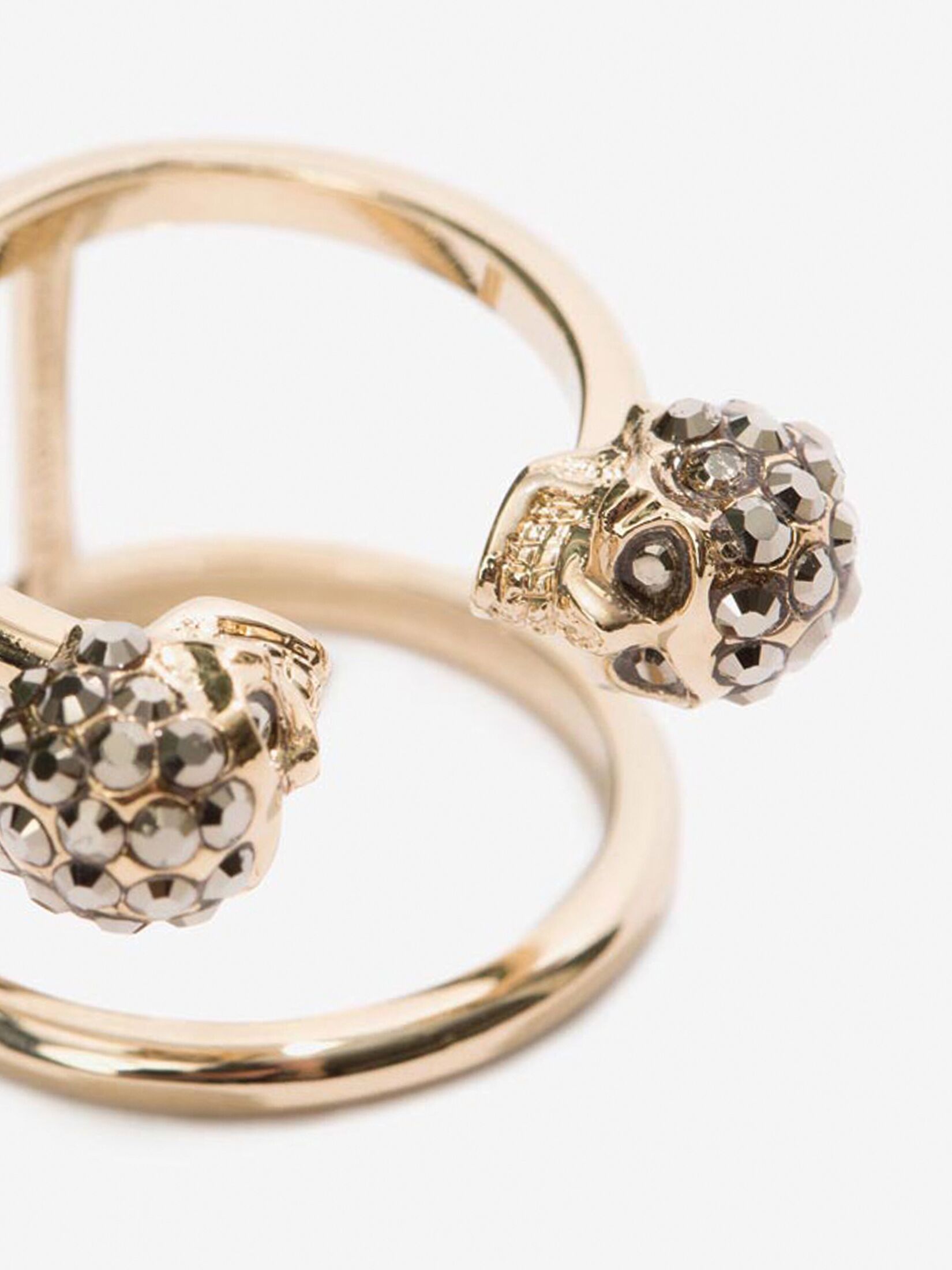Twin skull double ring