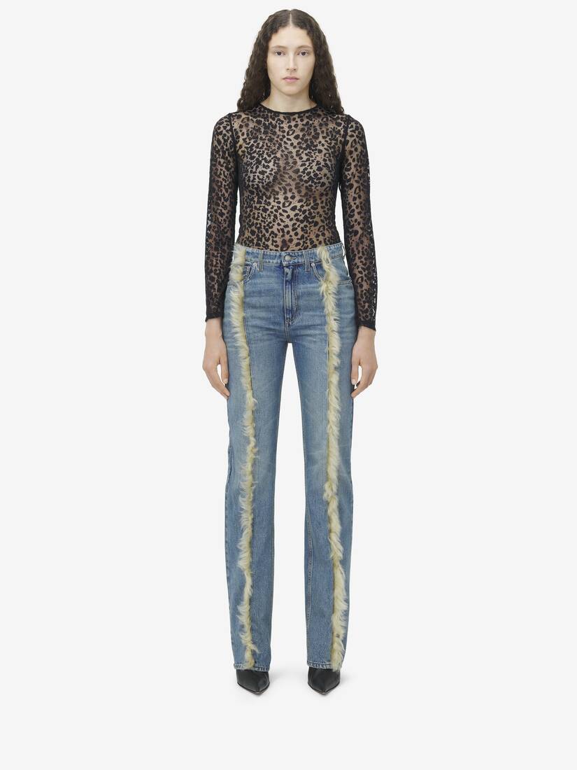 Jeans con finiture in shearling