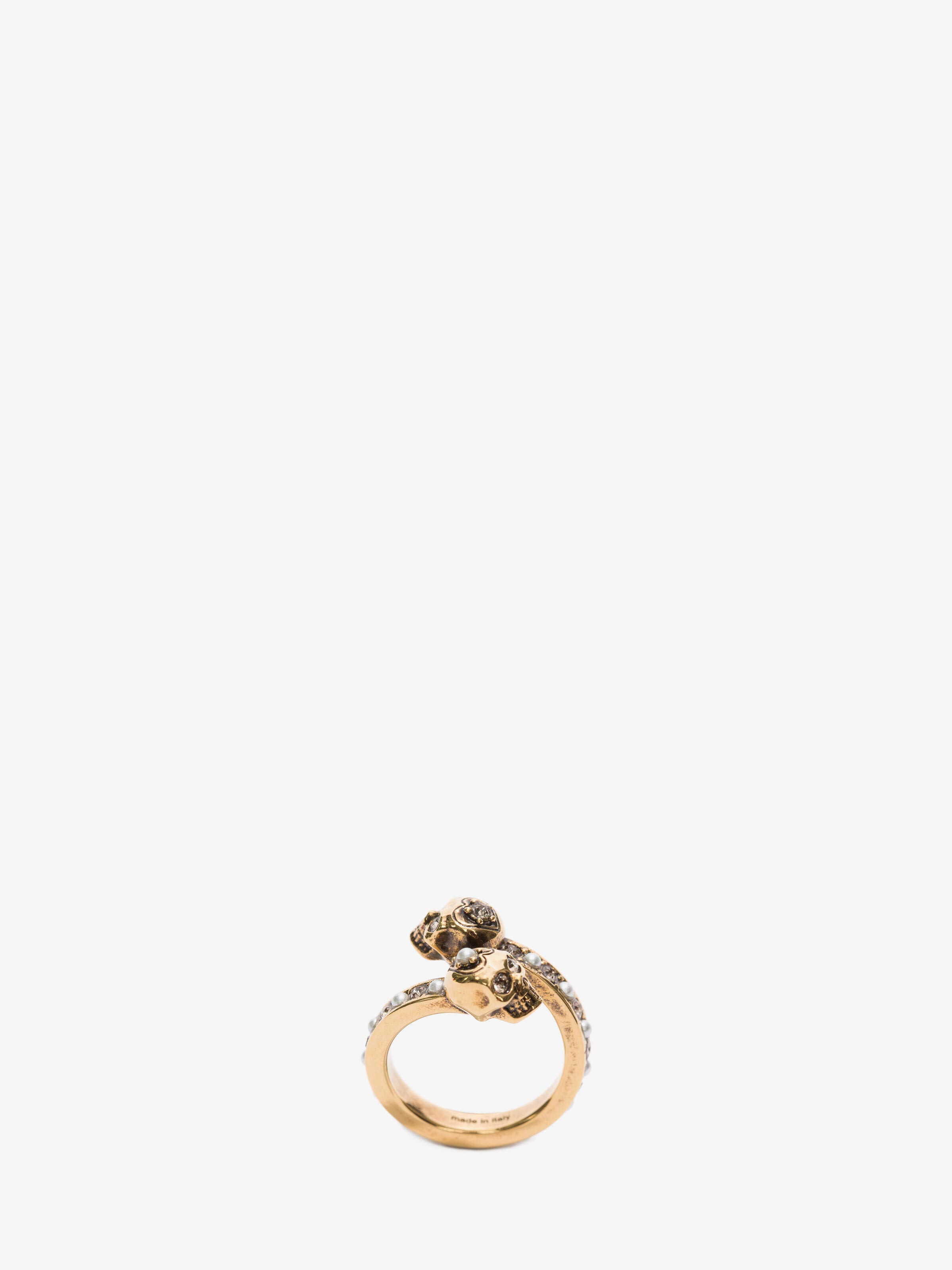 Women's Wrap-Around Skull Ring in Gold in Brass | Alexander McQueen - image 1