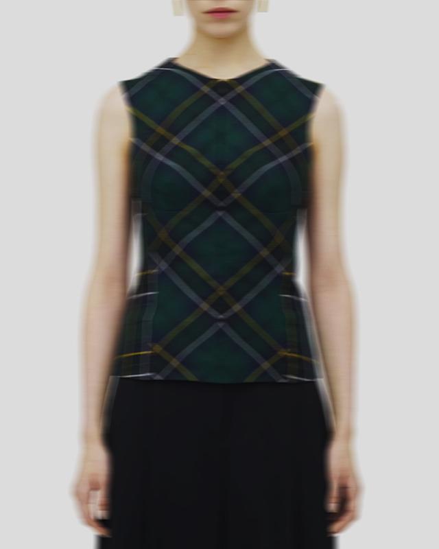 Model wearing McQueen tartan top