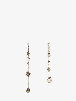 Pendants d'oreilles avec chaîne signature.