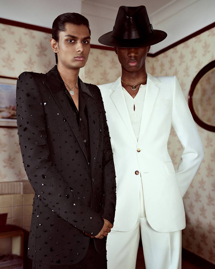 two models wearing suits